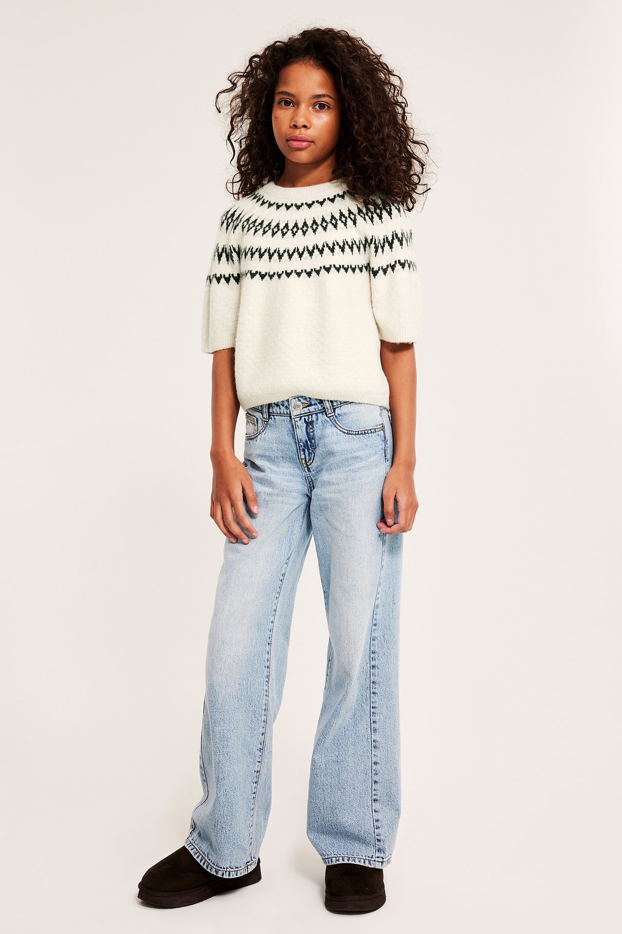 Stickad kortärmad tröja