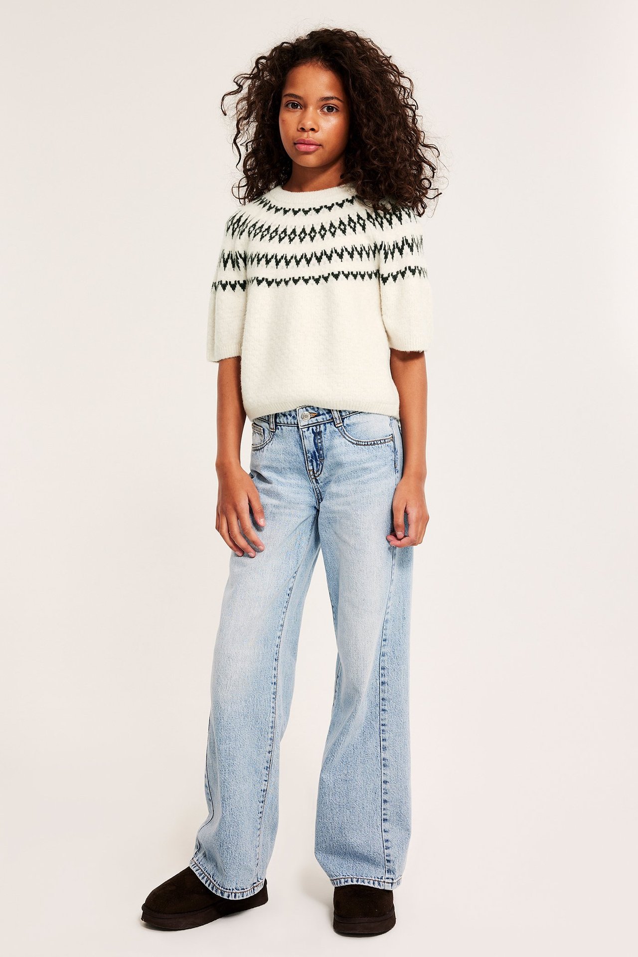 Stickad kortärmad tröja