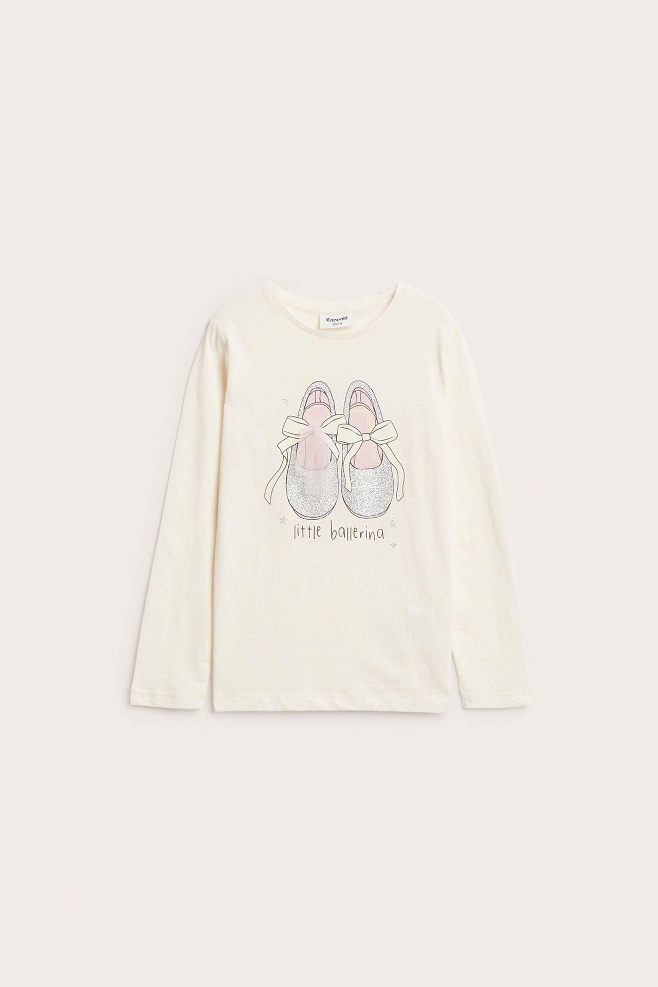 Z przodu: dziecięca kremowa bluzka bawełniana z długim rękawem, z brokatowymi baletkami.