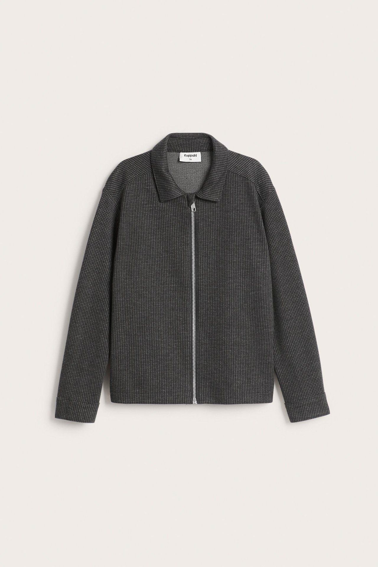 Framifrån, mörkgrå hundtandsmönstrad overshirt med krage och dragkedja i metall.