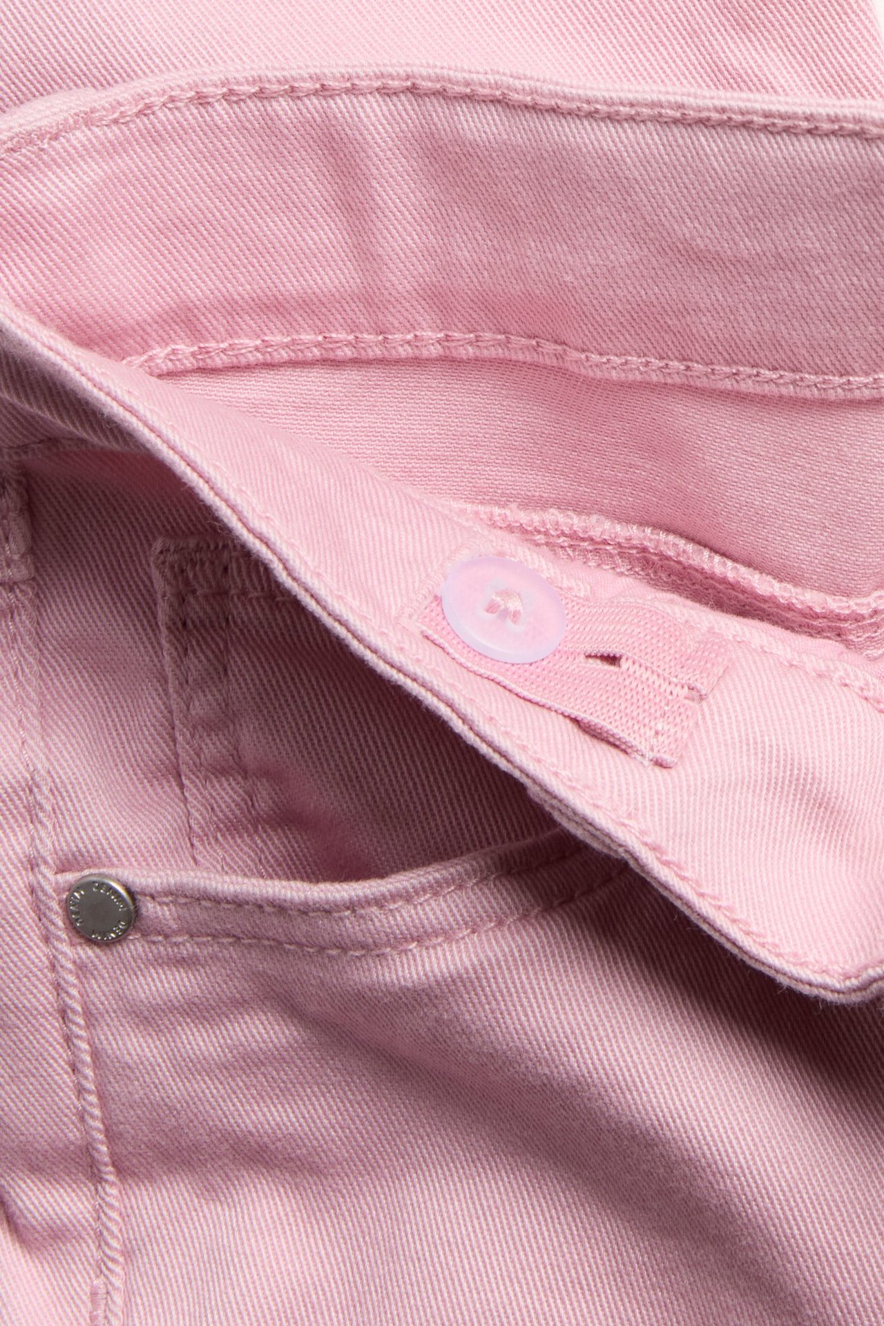 Vaaleanpunaiset joustavat bootcut farkut lapsille, säädettävällä vyötäröllä, nappi.