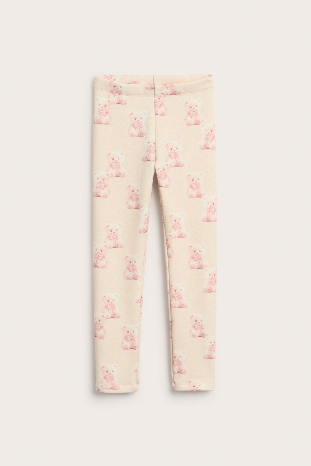 Lämmin vauvan leggings vaaleanbeigeä ja pinkki nallekuvio, pehmeä sisäpuoli.