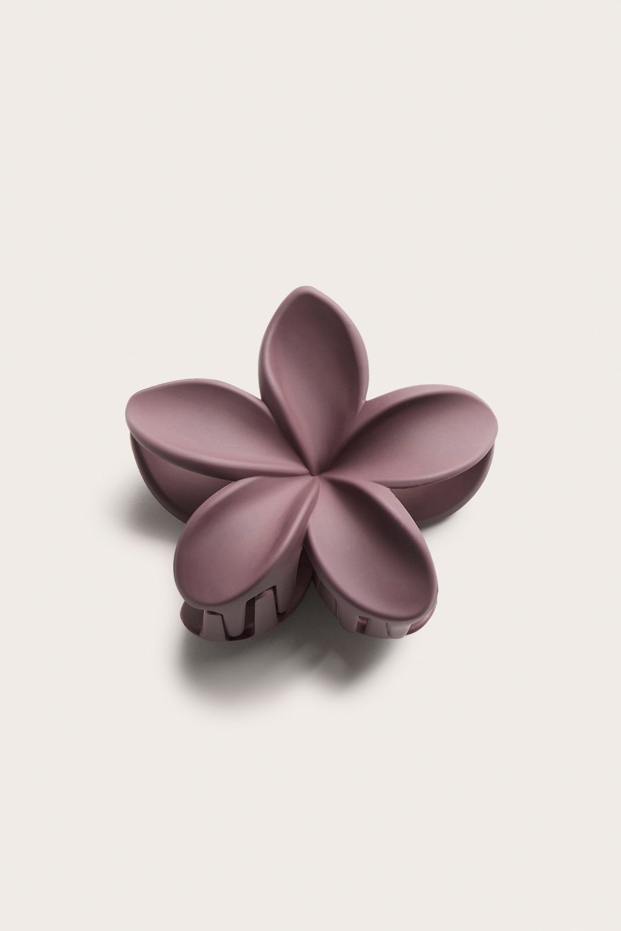 Hårklämma blomma