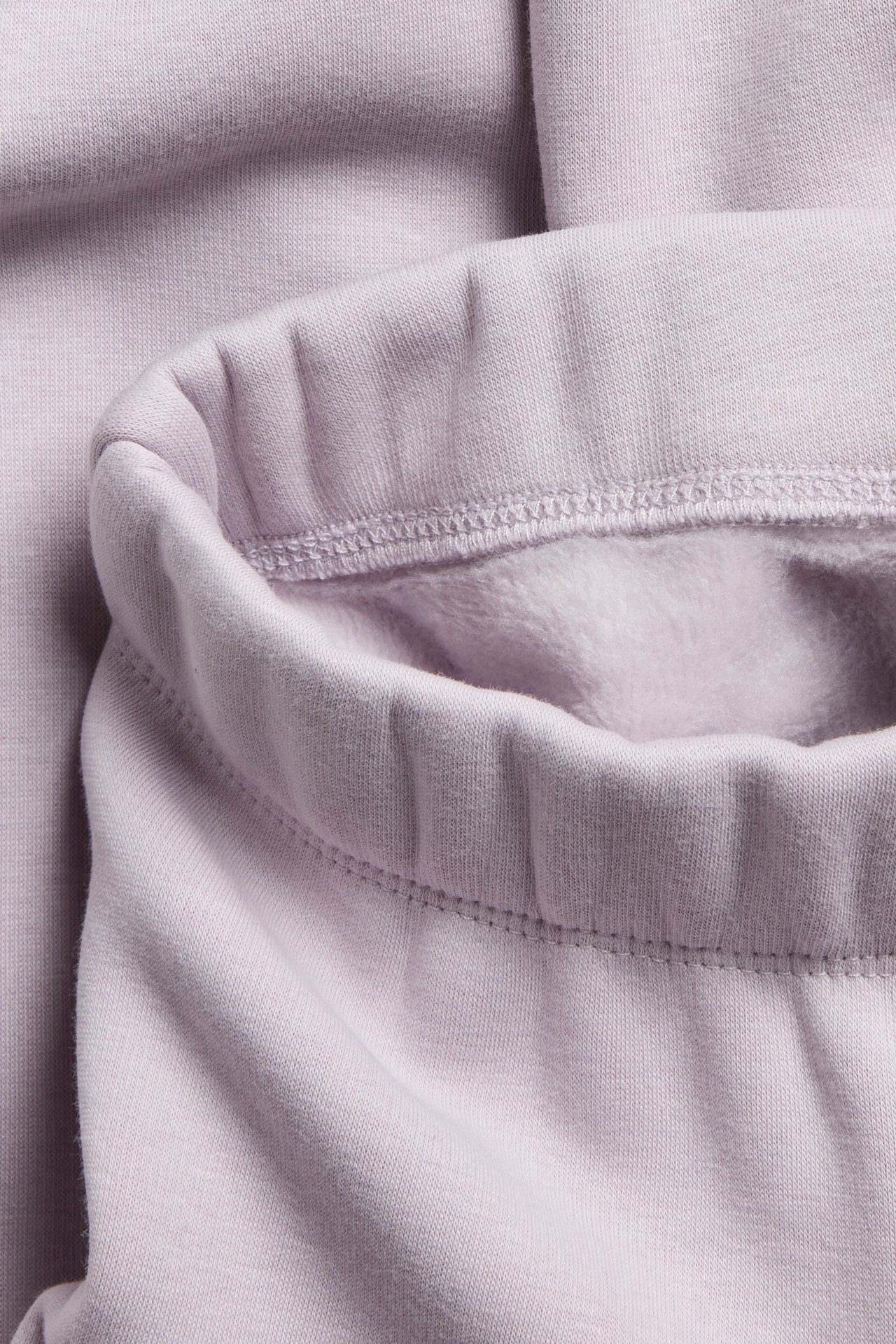 Cieple fioletowe legginsy typu flare, bawełna, miękka podszewka, elastyczny pas.