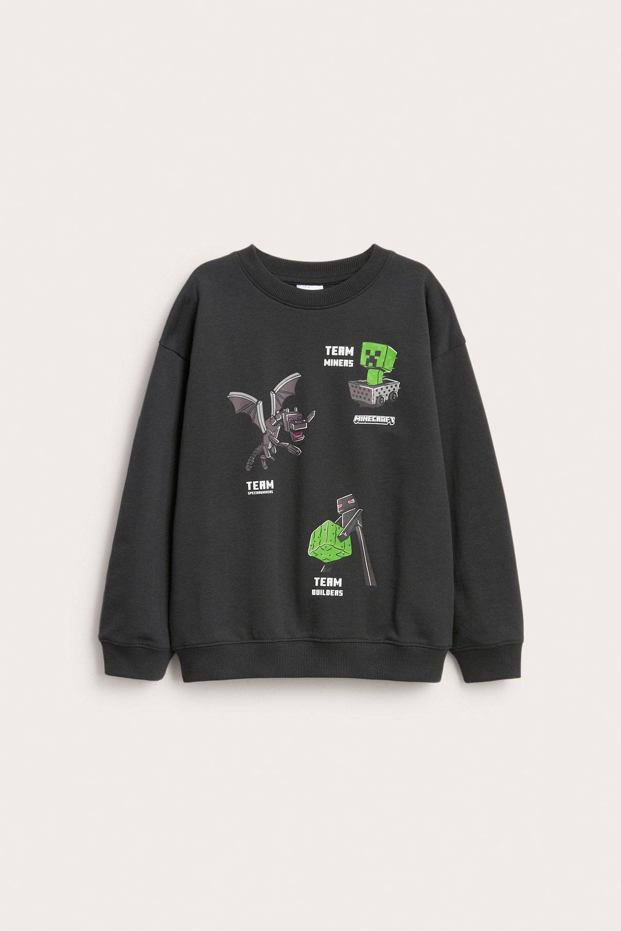 Musta collegepaita Minecraft-printillä, pehmeä sisäpuoli, ribattu kaulus ja hihansuu.