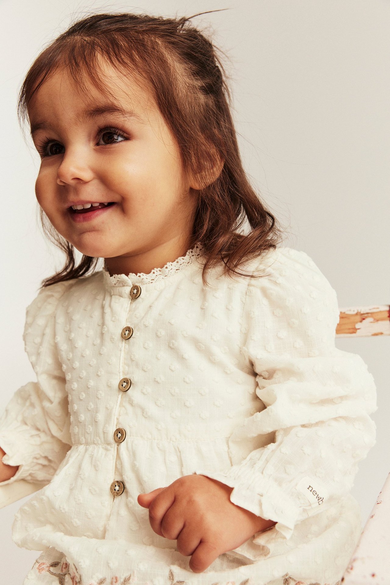 Kudottu röyhelösomisteinen puserobody