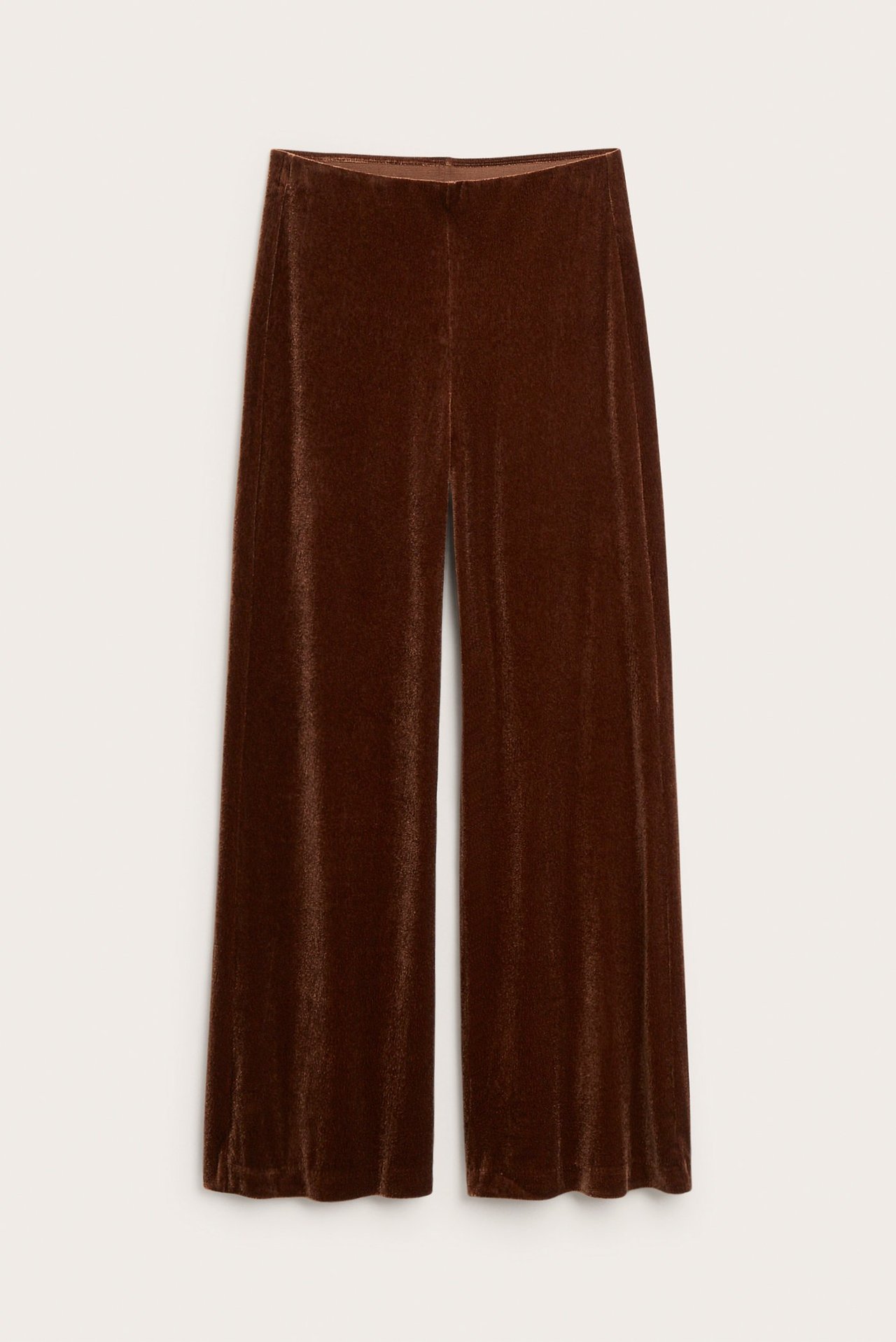 Forfra ensfargede brune vide bukser i fløyelsjersey.