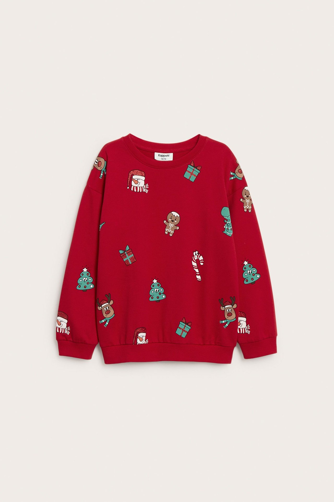 Framifrån, en röd sweatshirt i bomull för barn med festligt julmönster.