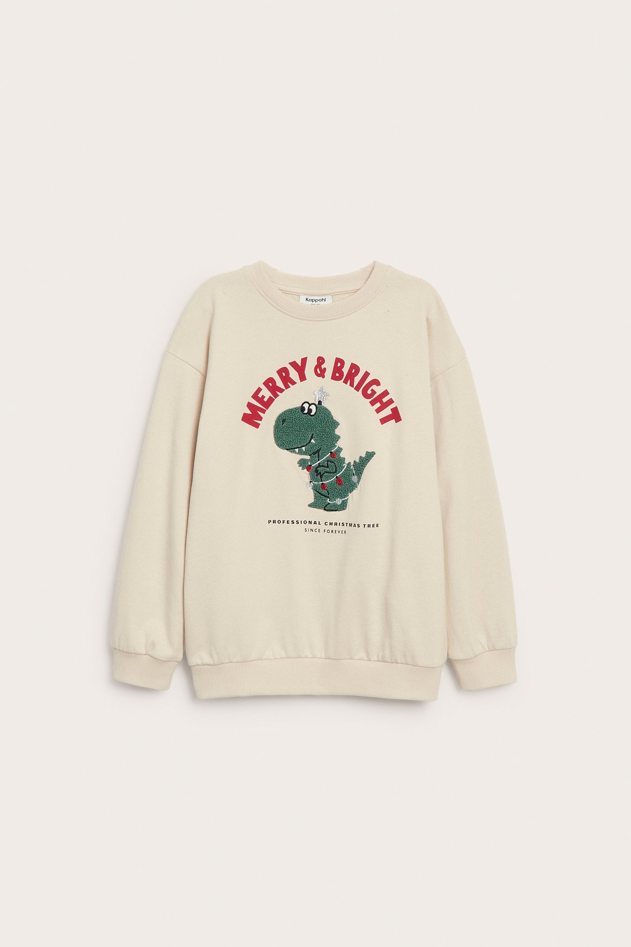 Frontvisning av lys beige bomullsgenser for barn med juledinosaurprint og teksten 'MERRY & BRIGHT'.