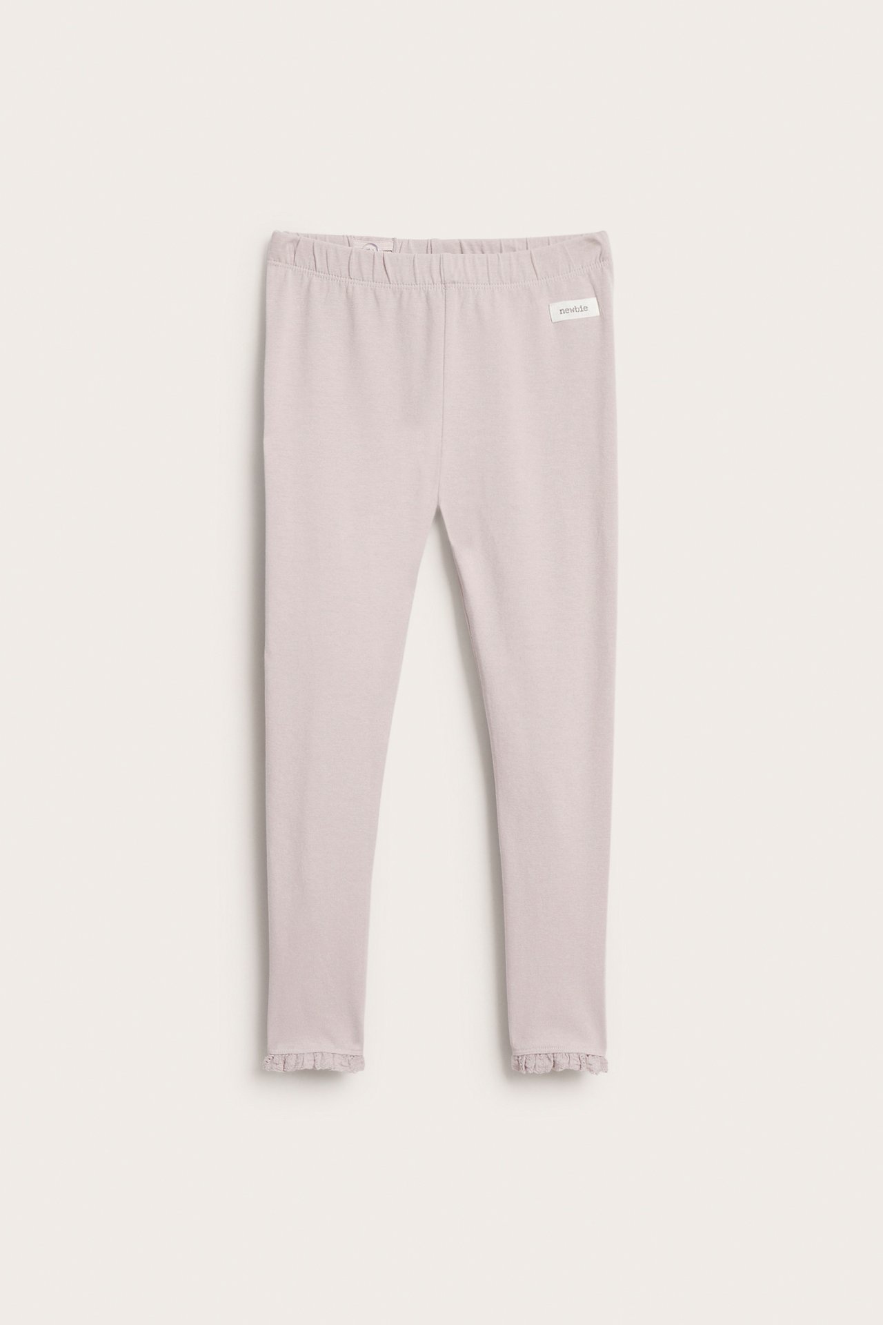 Frontvisning av babyens lyselilla leggings med elastisk midje og rysjekanter.