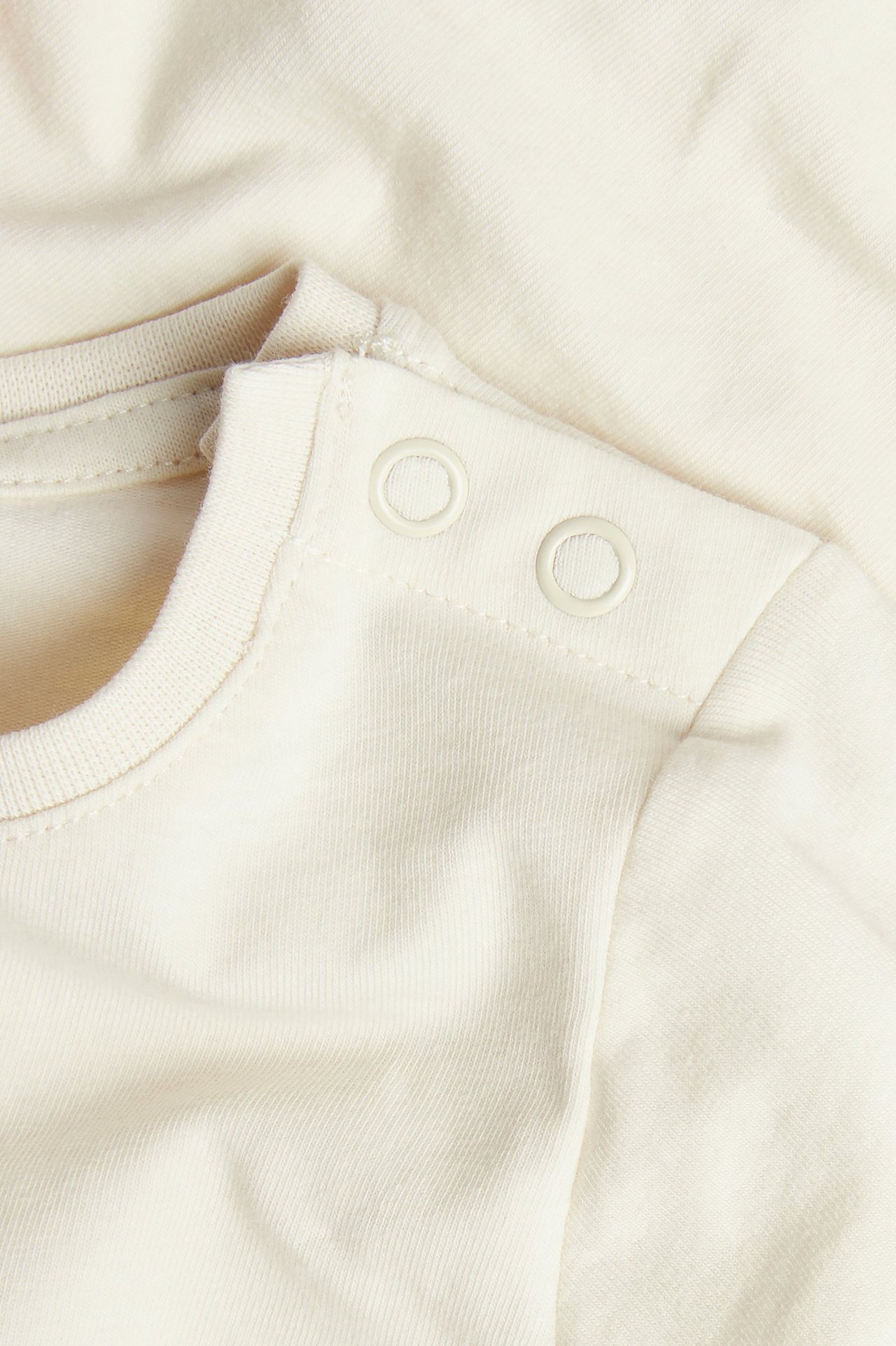 Långärmad body med djurmotiv