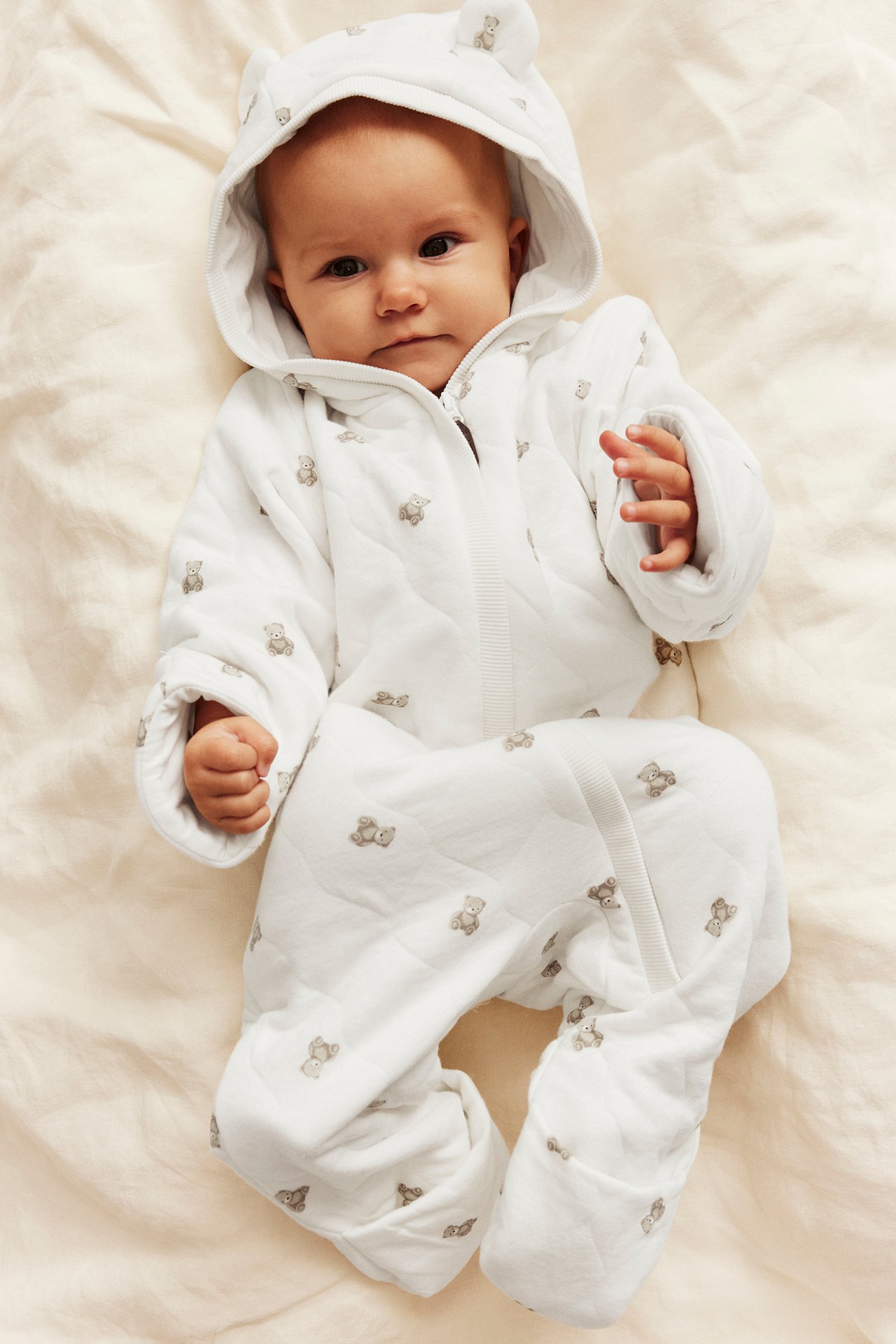 Quiltad overall med huva