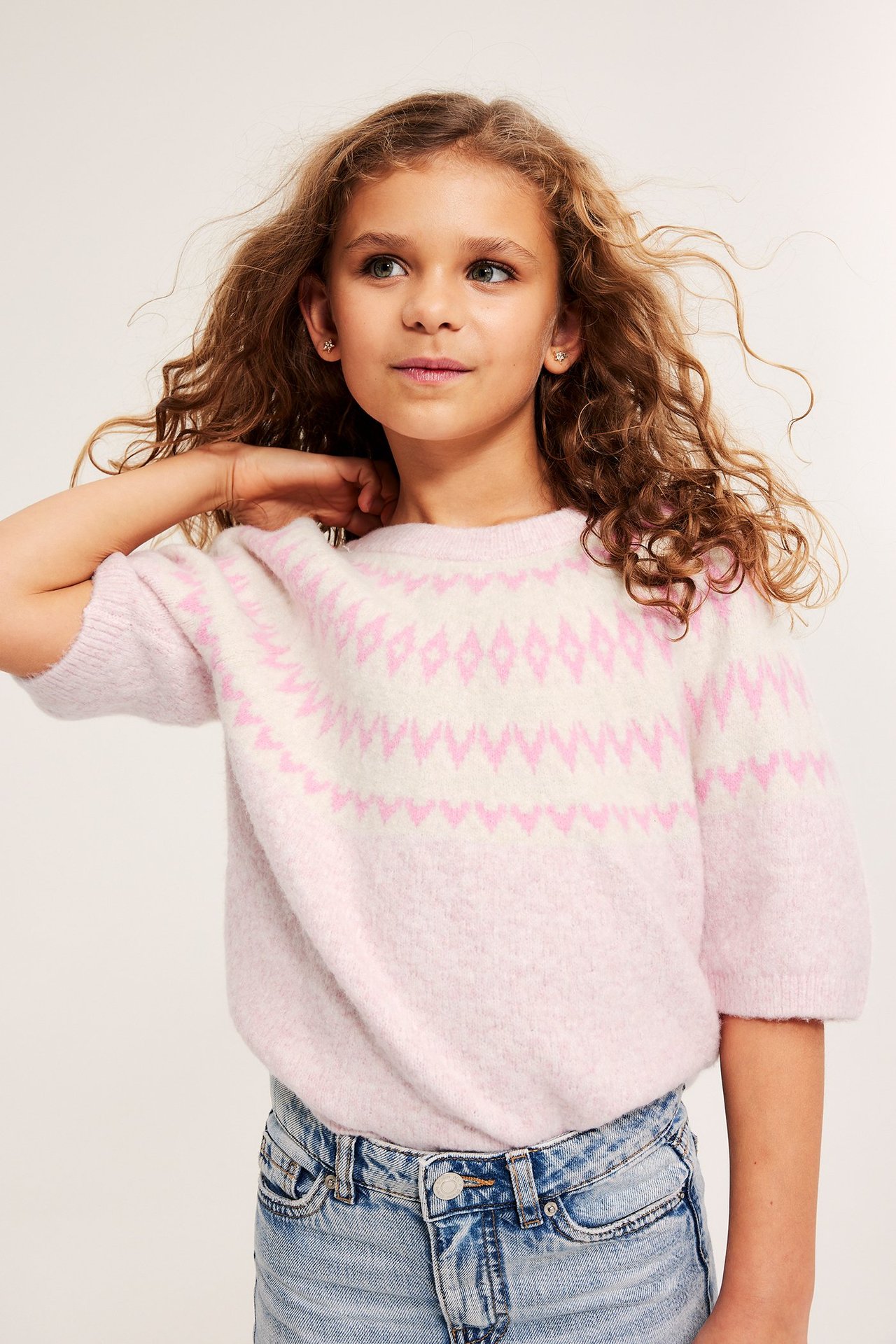 Stickad kortärmad tröja