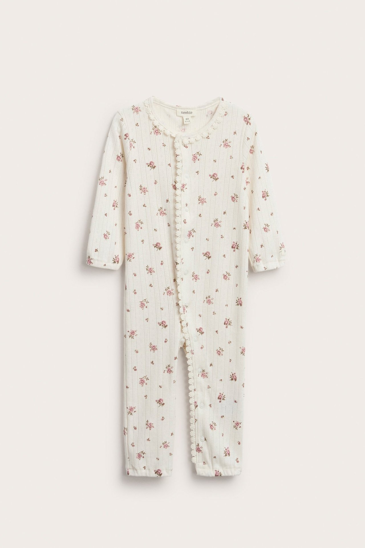 Blommig jumpsuit med spets