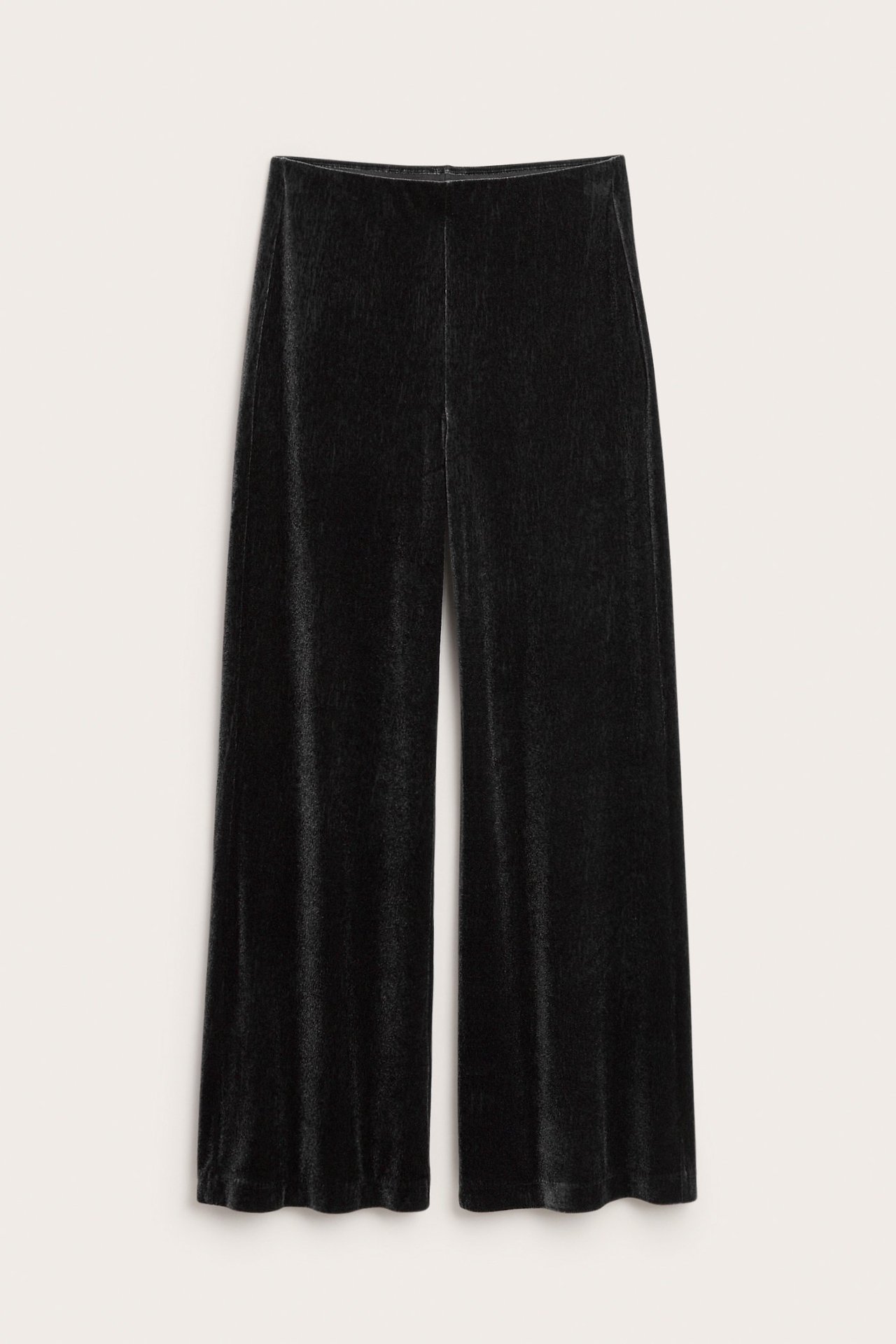 Frontbilde av svarte vide velourbukser.