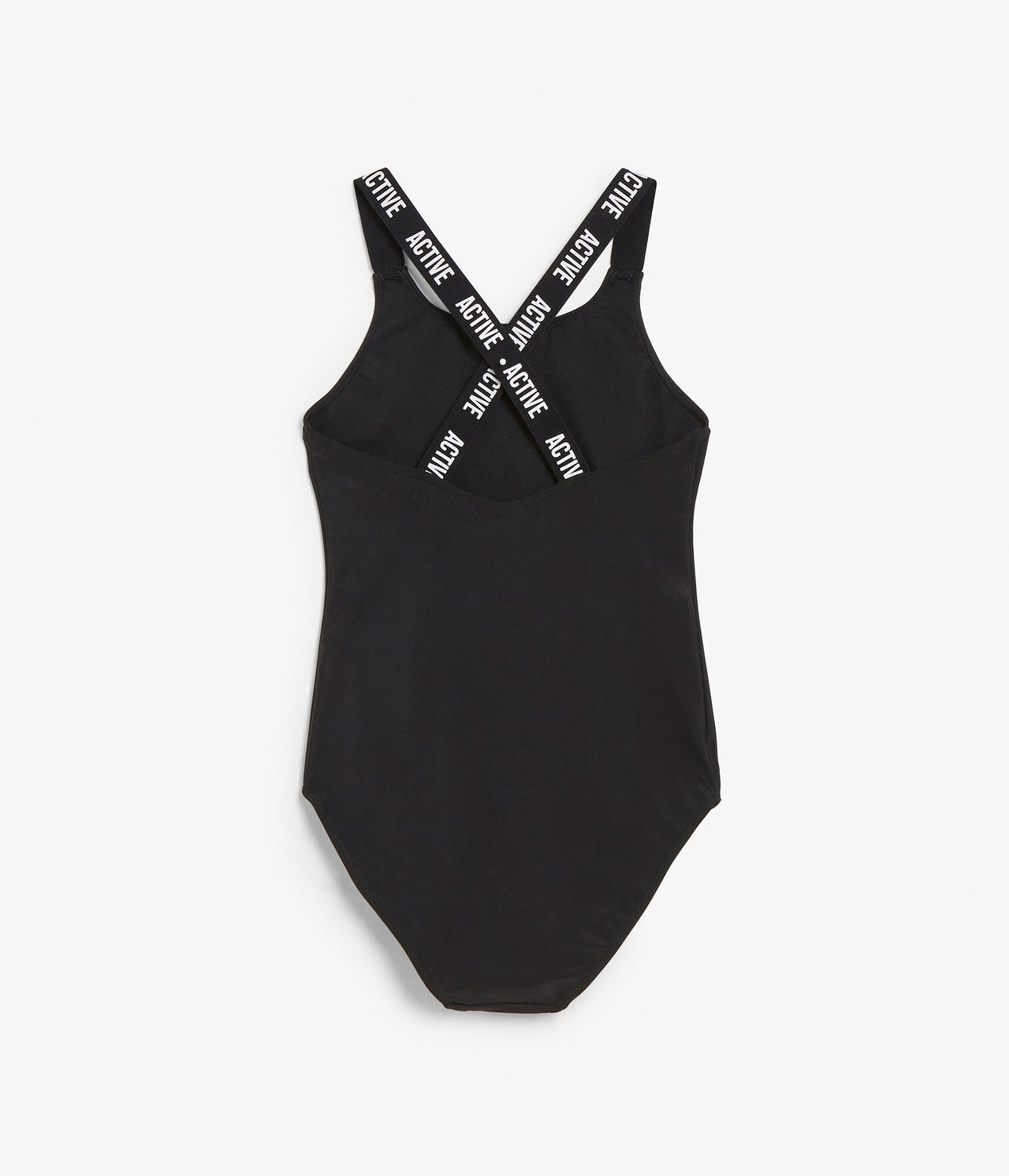 Takakuva mustasta lasten uimapuvusta, jossa valkoinen 'ACTIVE'-teksti ristiin menevissä olkaimissa.