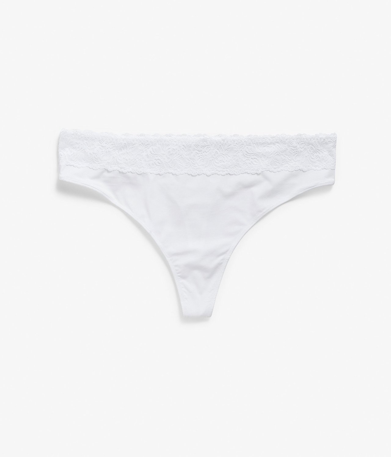Frontvisning av en hvit stringtruse med bred blondekant i midjen.
