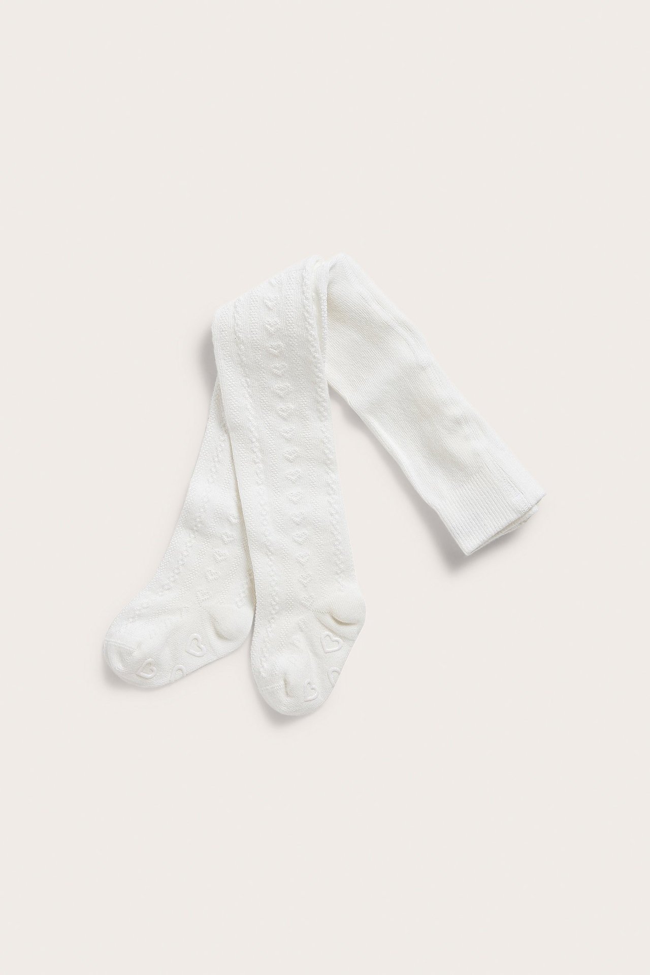 Newbie jacquard strømpebukse i offwhite med antiskli, bomull, barnemodell.