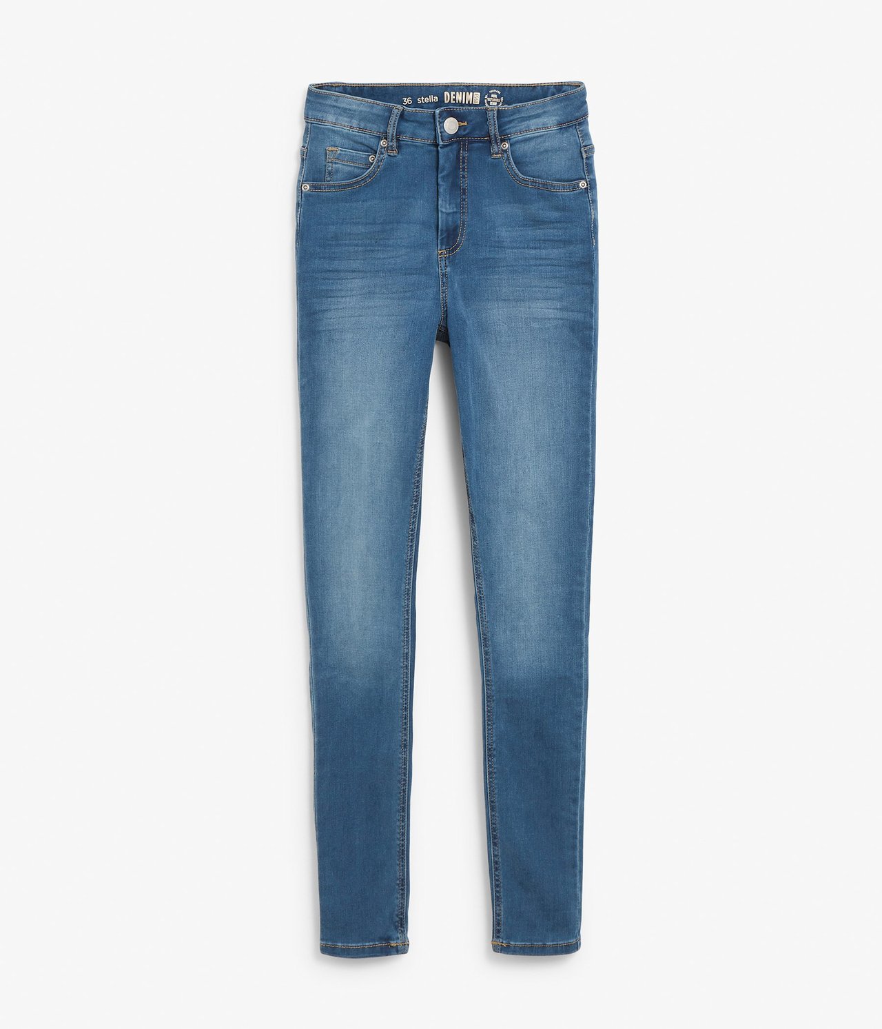Framifrån, blåa super slim denimjeans med extra långa ben, med knapp- och dragkedjestängning.