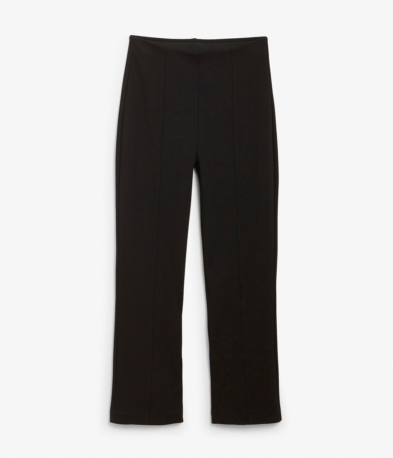 Widok z przodu: czarne spodnie pull-on z rozszerzanymi nogawkami i pionowymi szwami.