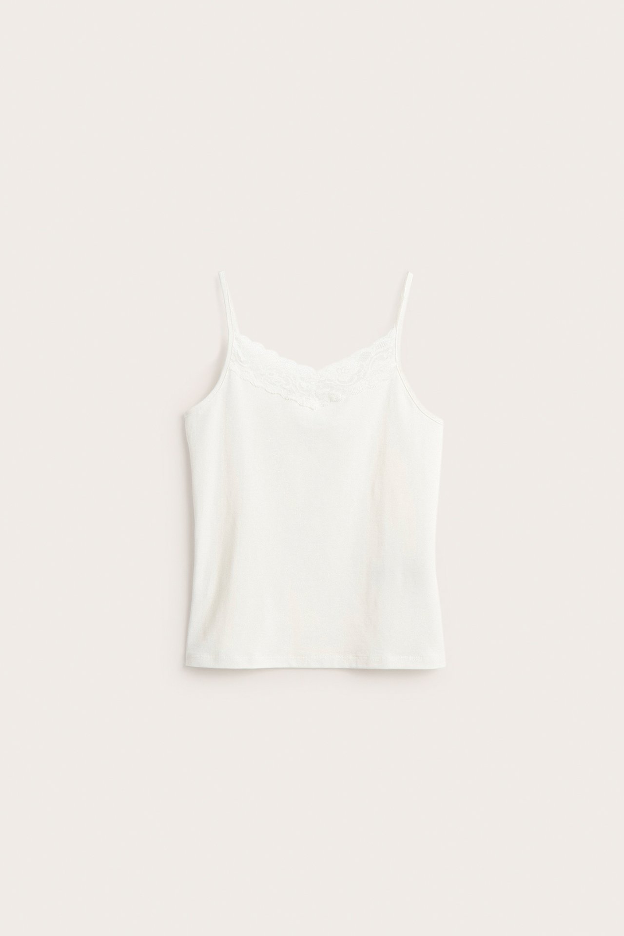 Singlet med blonder