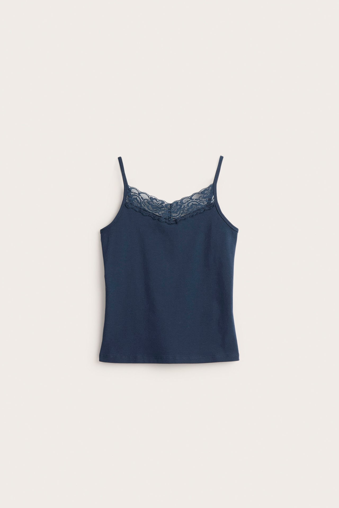 Singlet med blonder