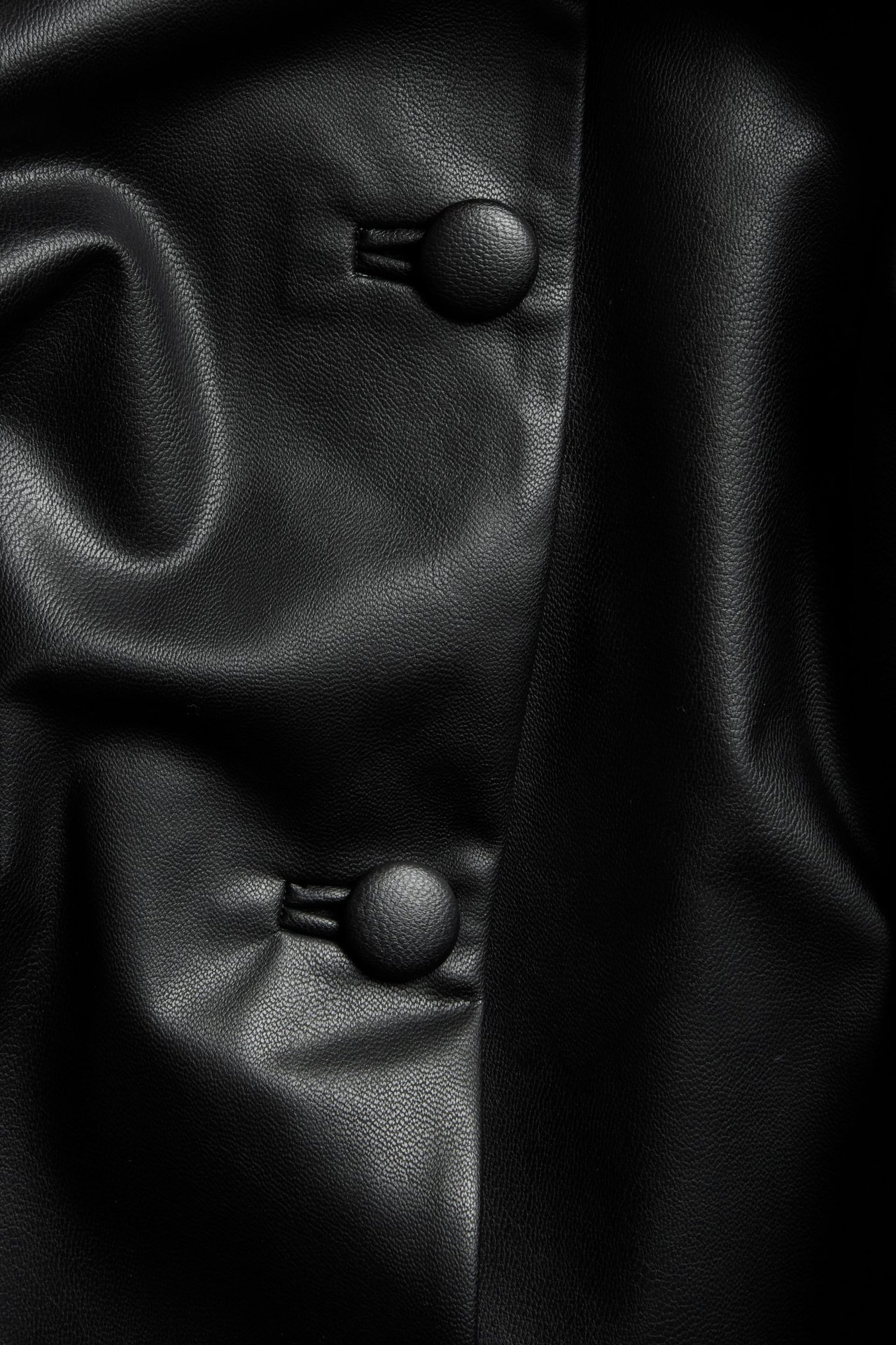 Kort jakke i imitert skinn