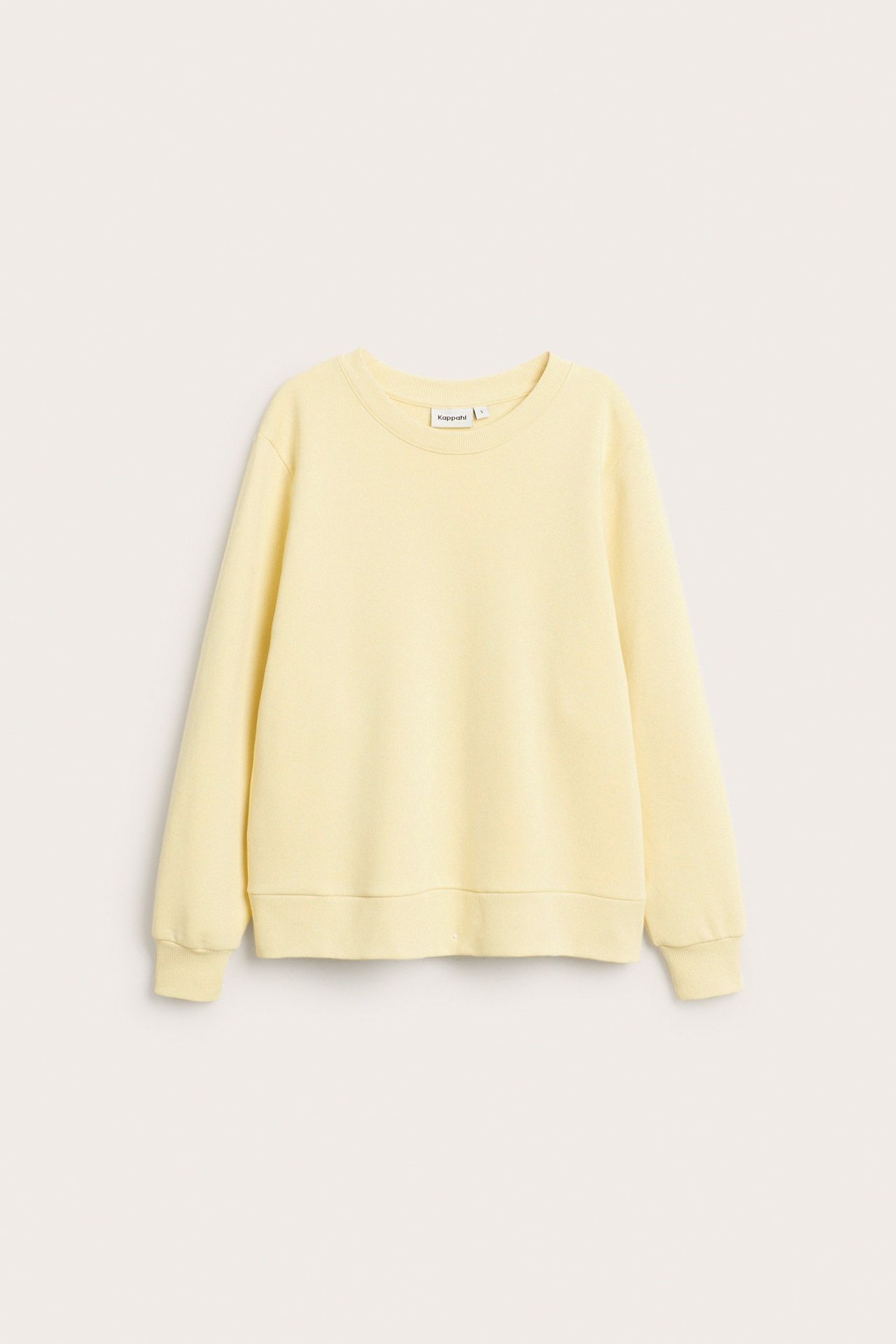 Widok z przodu żółtej bluzy z okrągłym dekoltem i prążkowanymi detalami, z mieszanki bawełny.