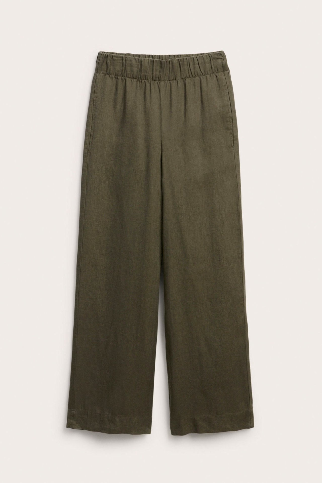 Widok z przodu: lniane spodnie wide fit khaki z elastycznym pasem i kieszeniami bocznymi.