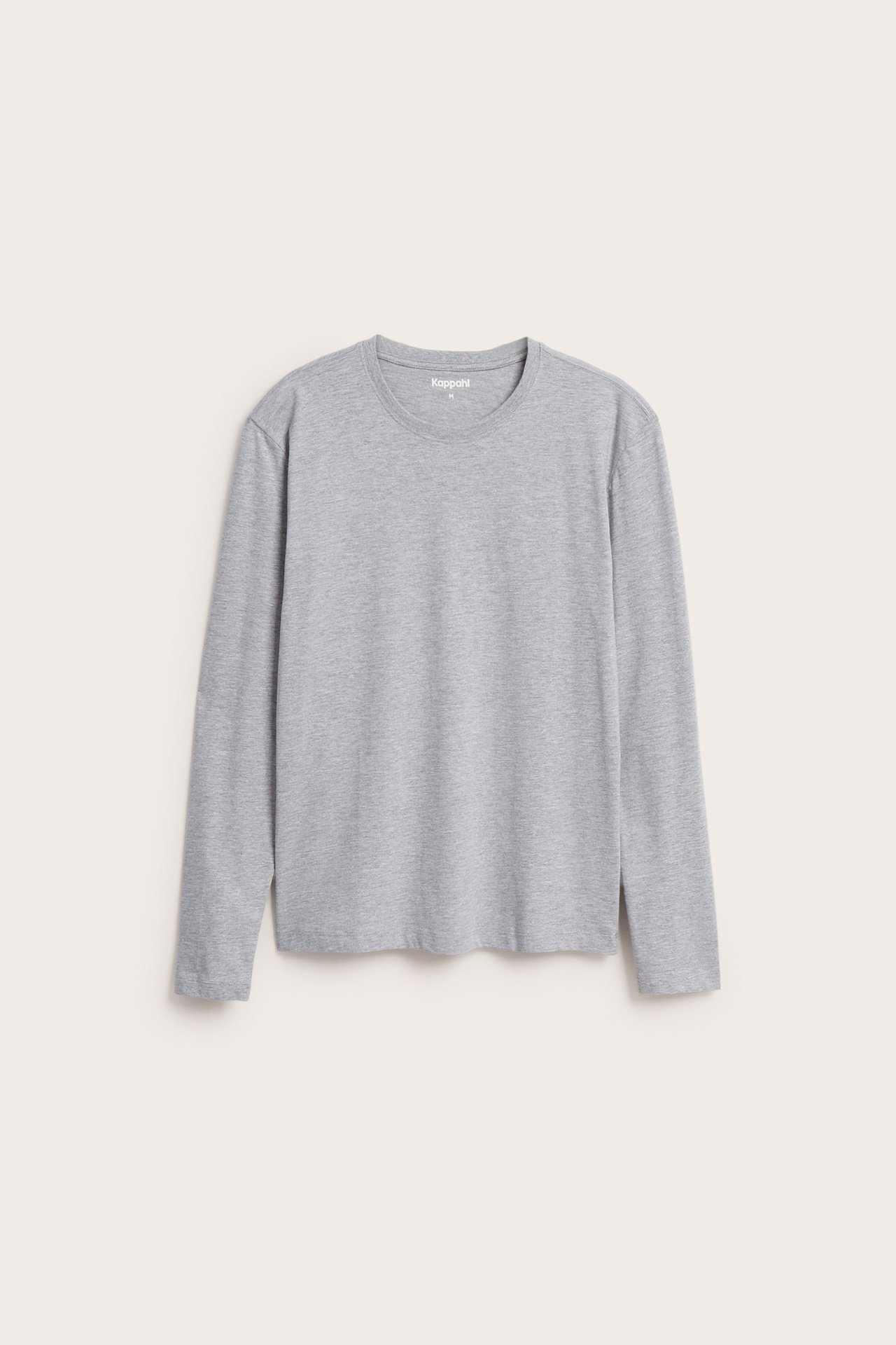 Edestä kuvattu miesten yksivärinen vaaleanharmaa pitkähihainen t-paita pyöreällä pääntiellä ja sivuaukoilla.