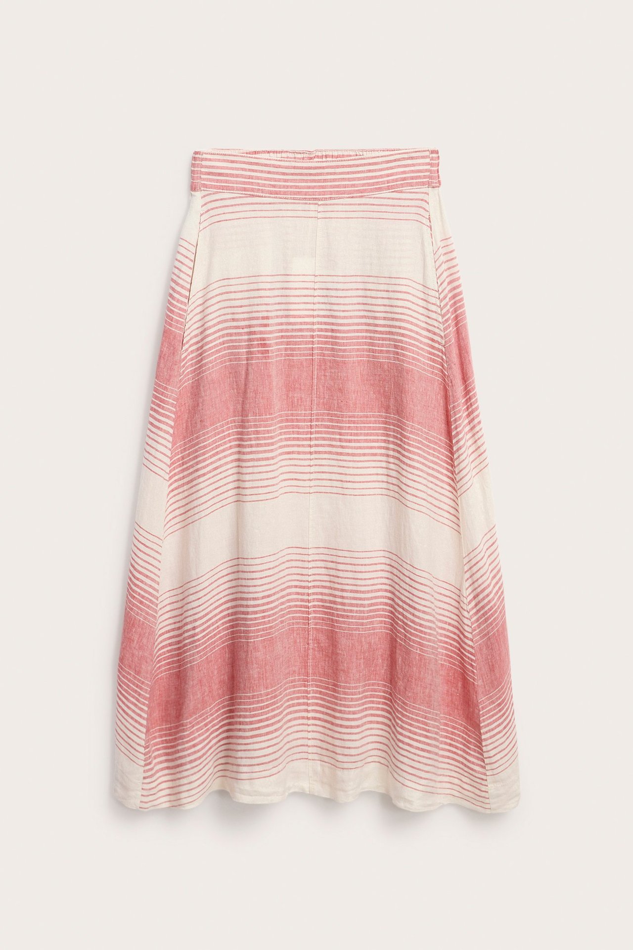 Framifrån: Lång, randig röd- och krämfärgad linnekjol med resår i midjan.