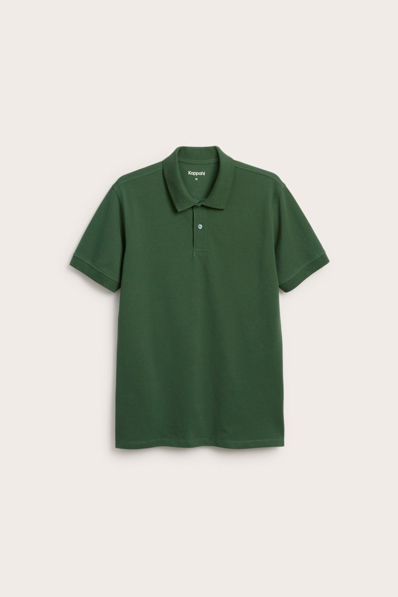 Frontbilde av en ensfarget grønn bomullspiké for menn med to knapper.