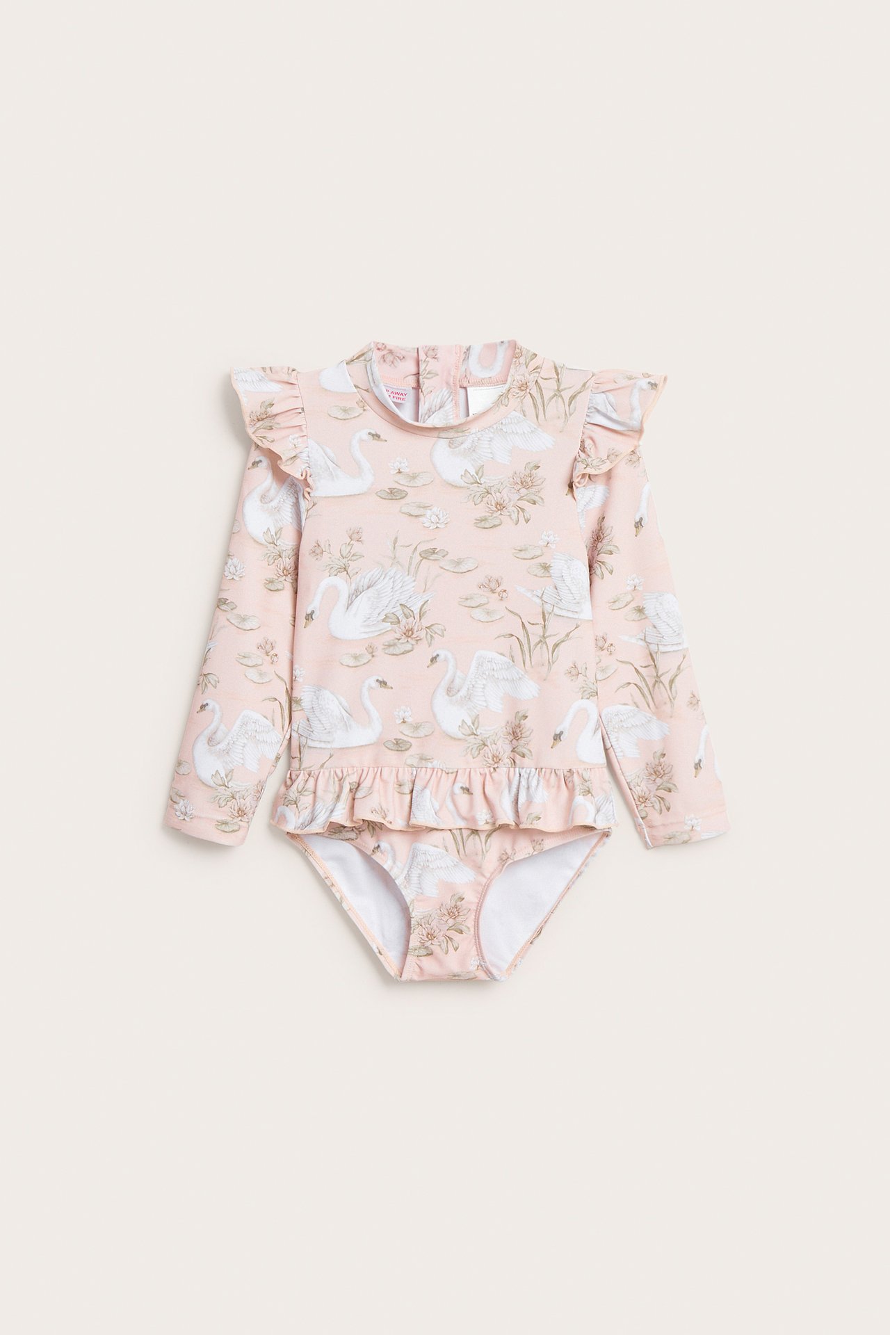 Framifrån: Rosa UV-baddräkt för baby/barn med svanmönster, 3/4 ärm, dragkedja bak, volanger.