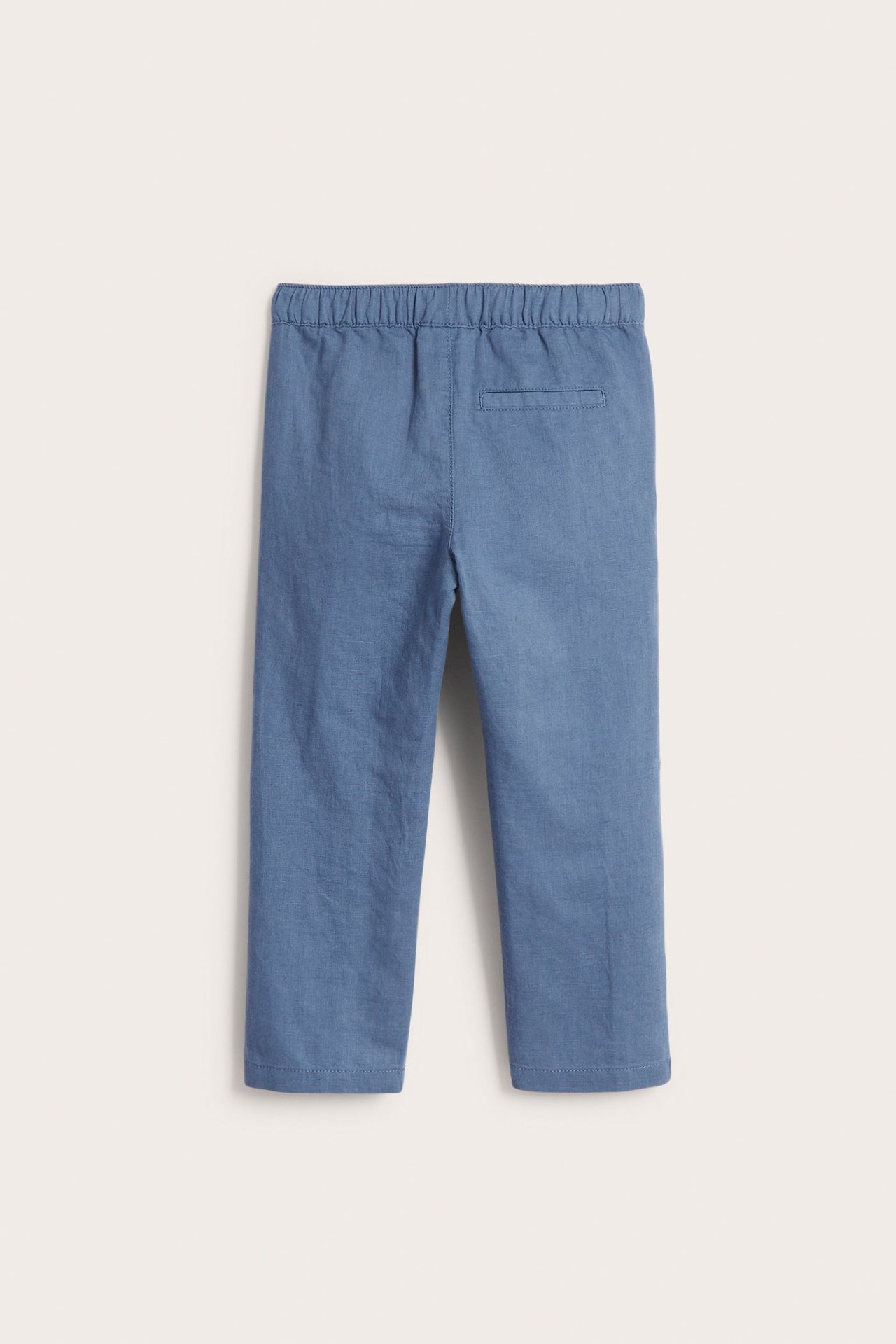 Takakuva: Lasten siniset pellavasekoitevetohousut joustovyötäröllä ja yhdellä takataskulla.