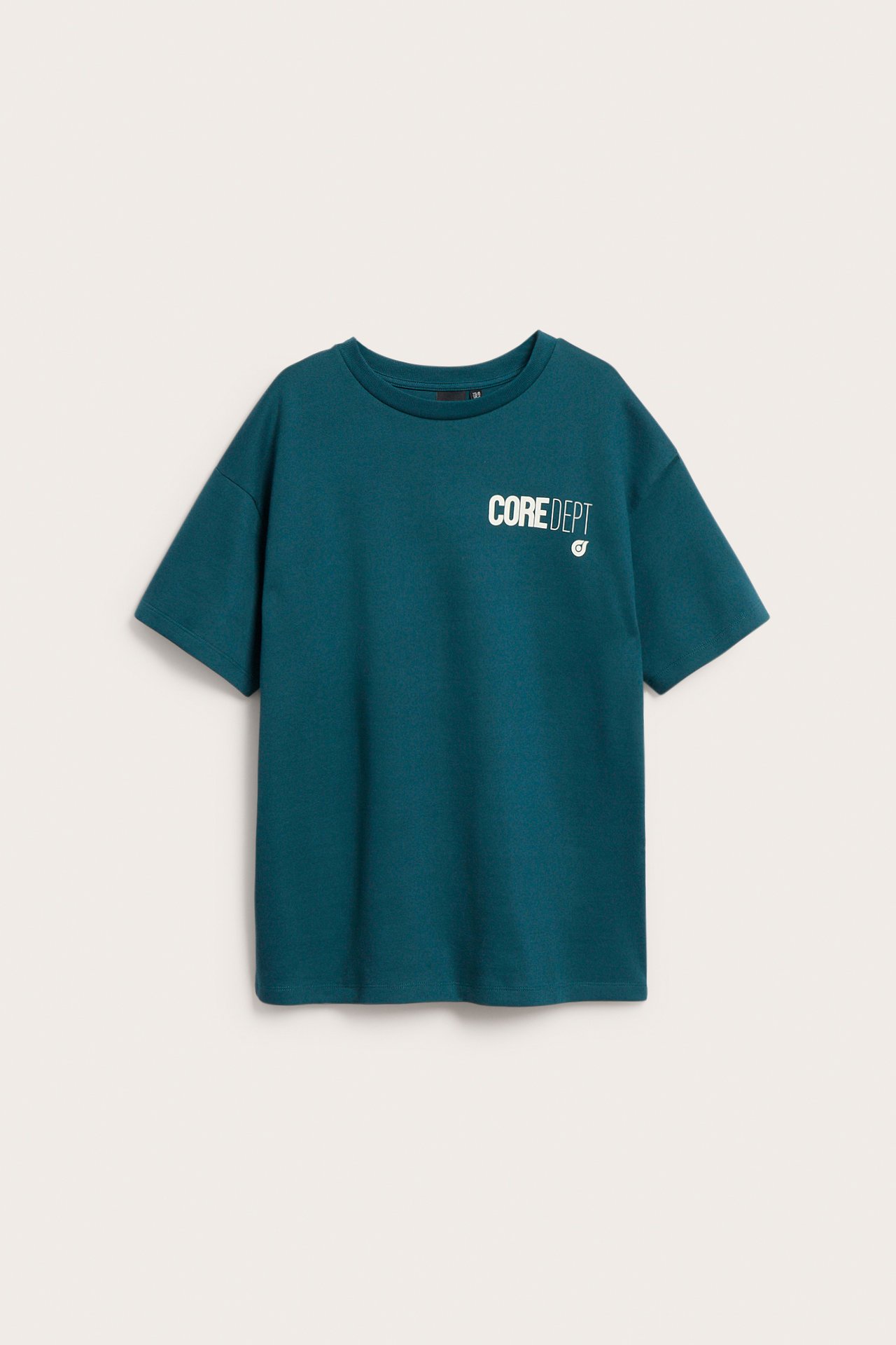 Vihreä oversized-t-paita, jossa valkoinen 'COREDEPT'-painatus edessä, tasokuva.