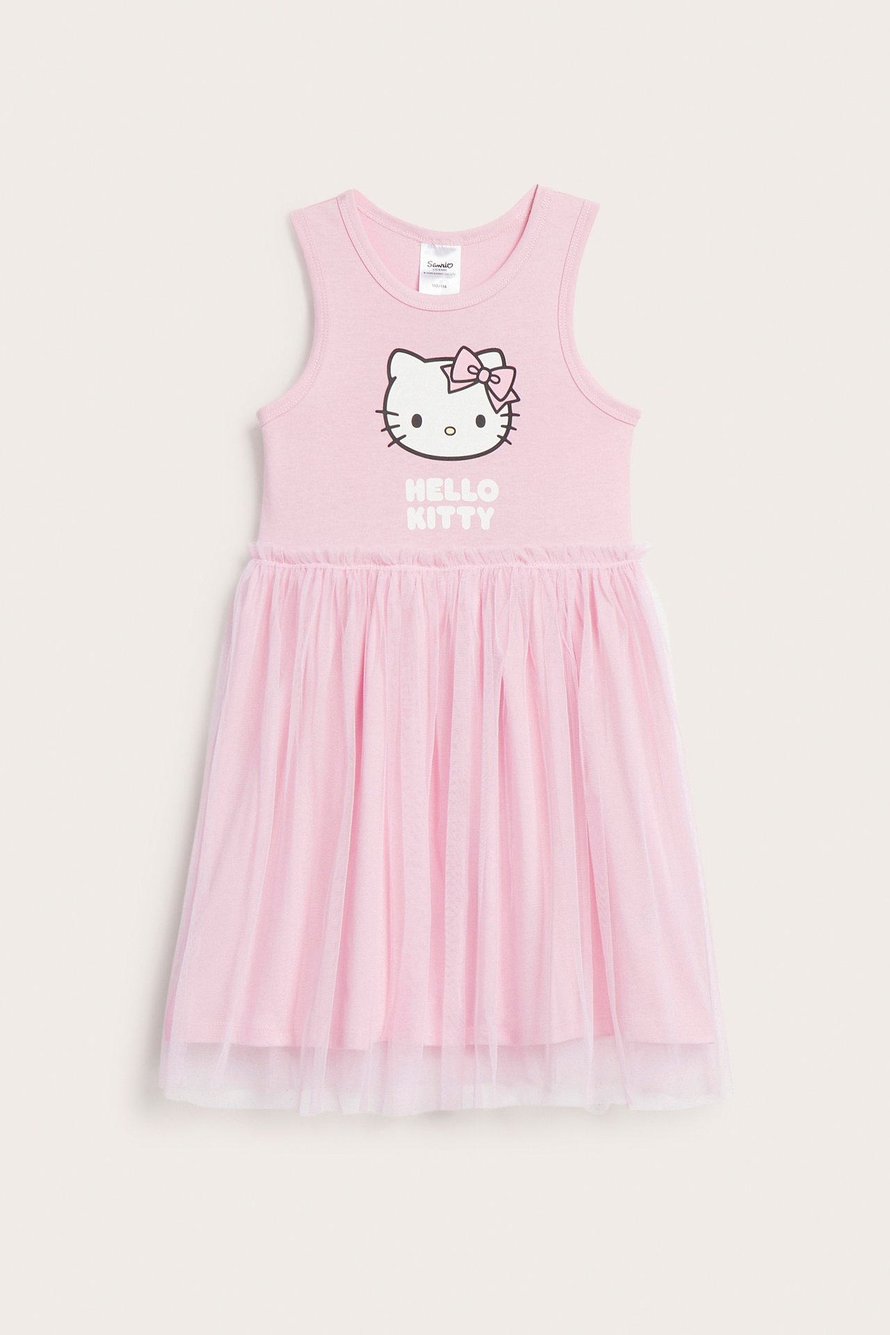 Widok z przodu różowej, bezrękawnikowej sukienki Hello Kitty z dzianiny i marszczoną tiulową spódnicą.