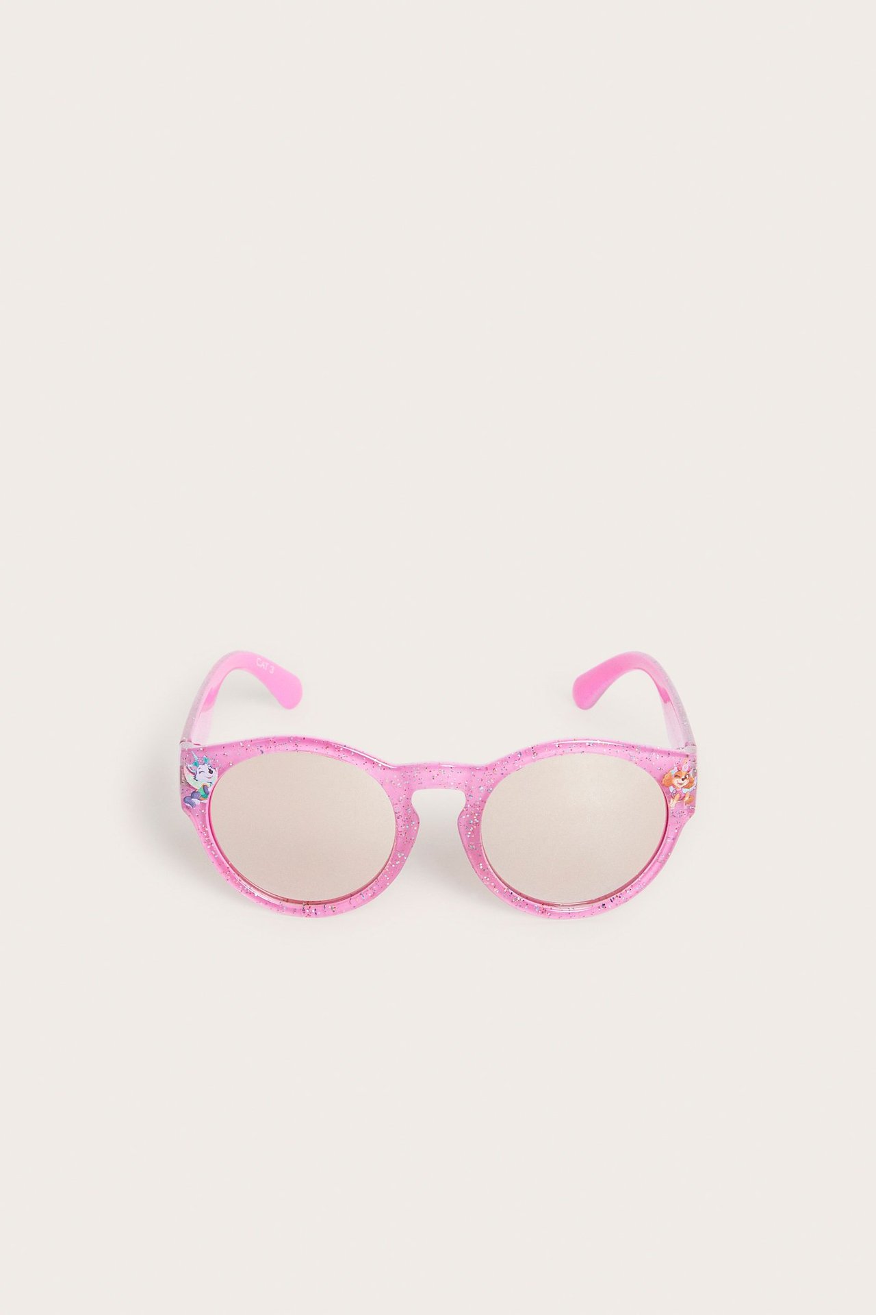 Edestä: Vaaleanpunaiset kimaltelevat muoviaurinkolasit Ryhmä Hau -kuviolla.