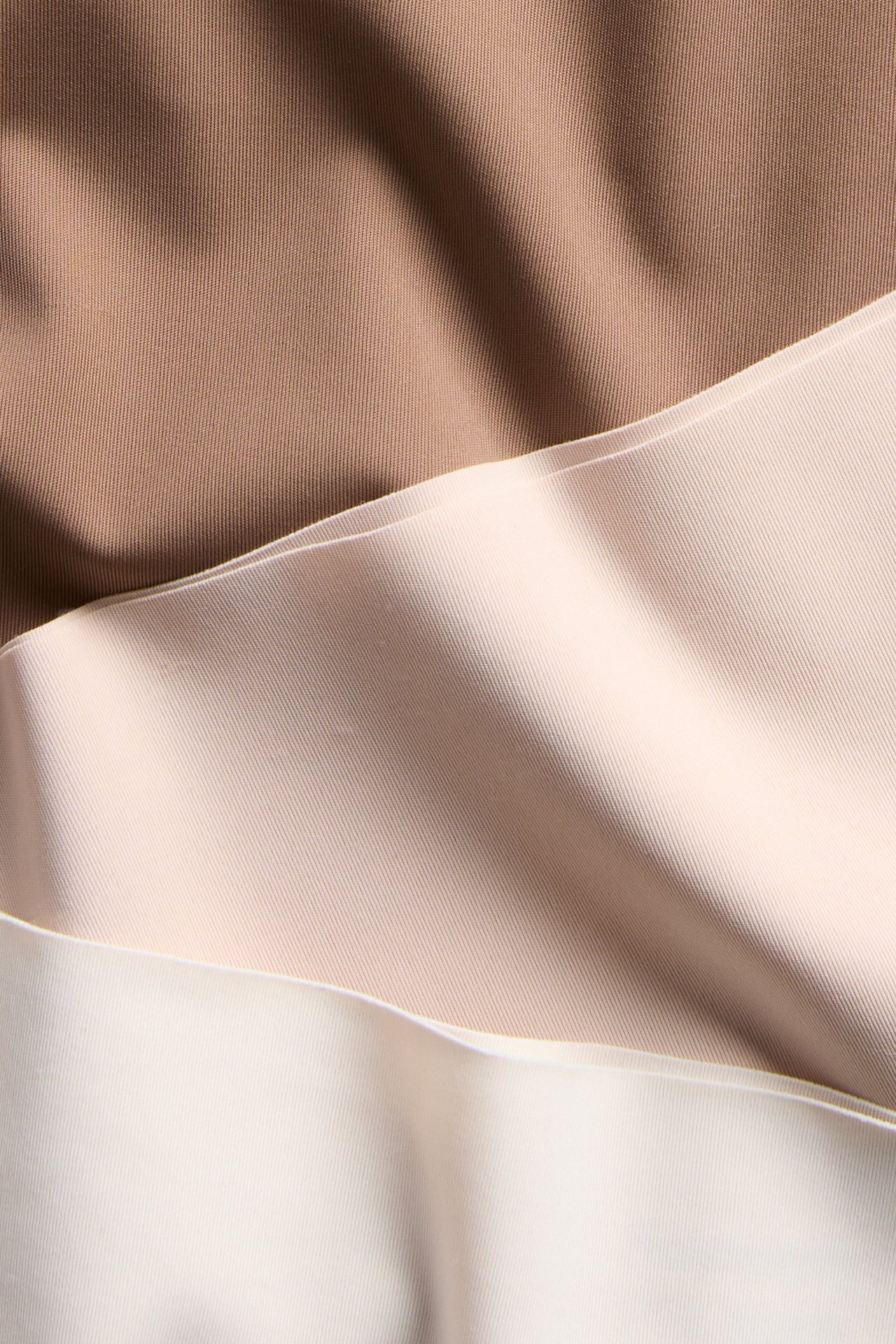 Nærbilde av 3-pakning cleancut hipster-truser i ulike brun- og beigetoner av mikrokvalitet.