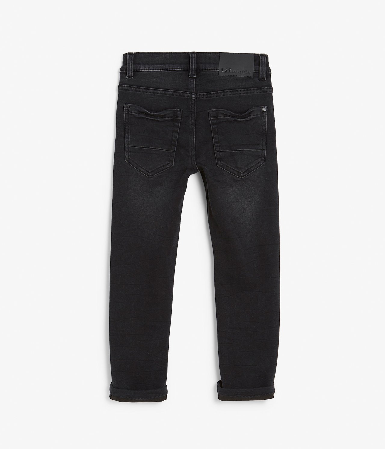 Bakifrån: Barns svarta slim fit joggerjeans i denim med 5 fickor och upprullade benslut.