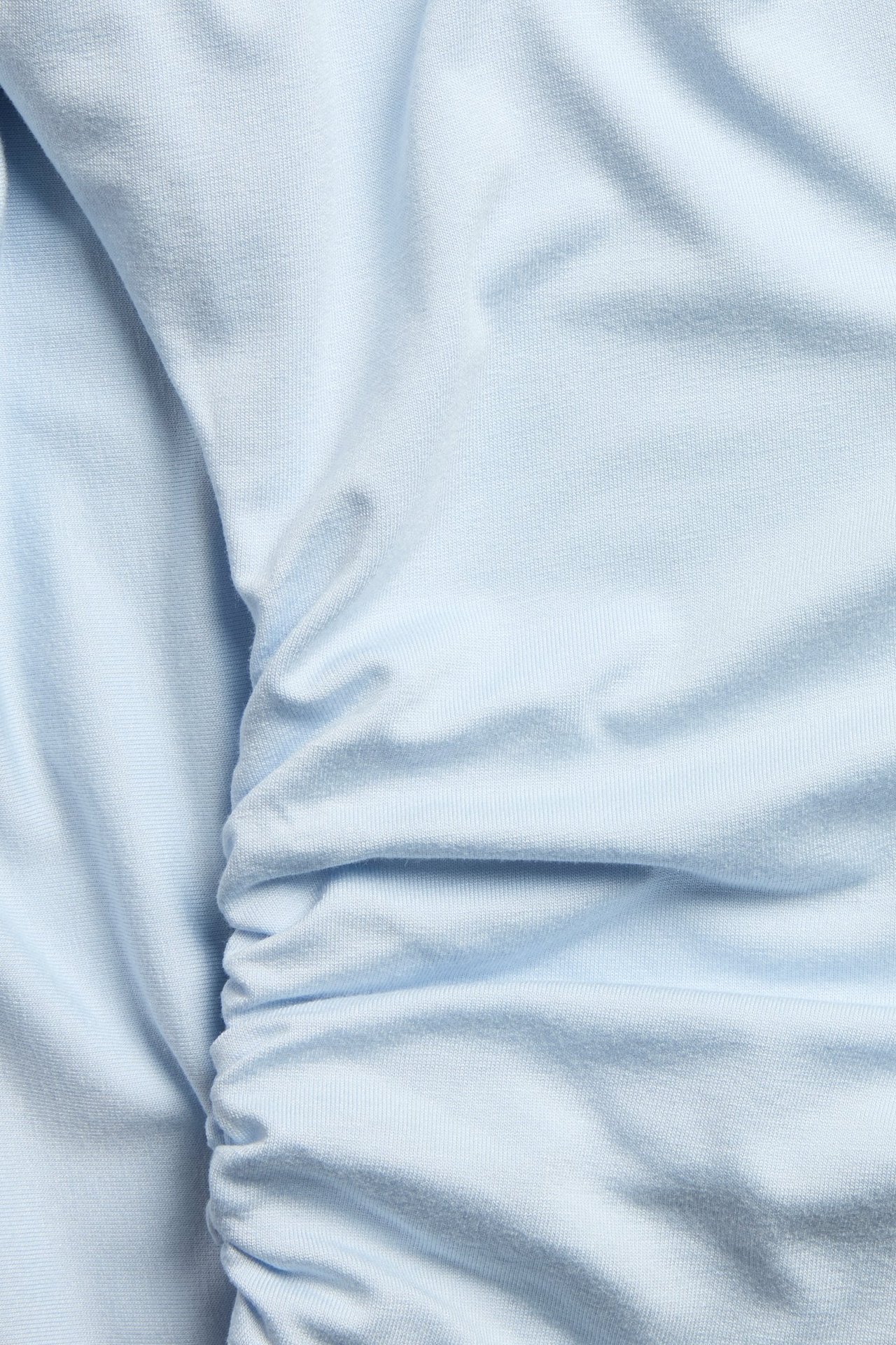 Långärmad blå topp med fjärilsärm i elastan och viskose, enfärgad, för barn, frontalvy.