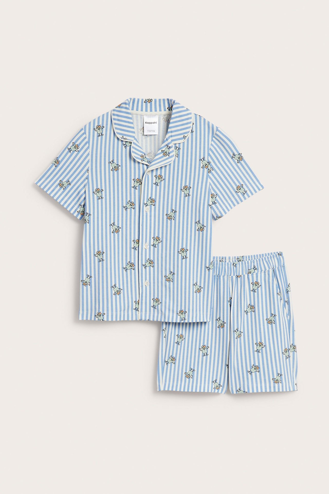 Widok z przodu, dziecięca piżama z krótkimi rękawami, w biało-niebieskie paski z potworami.