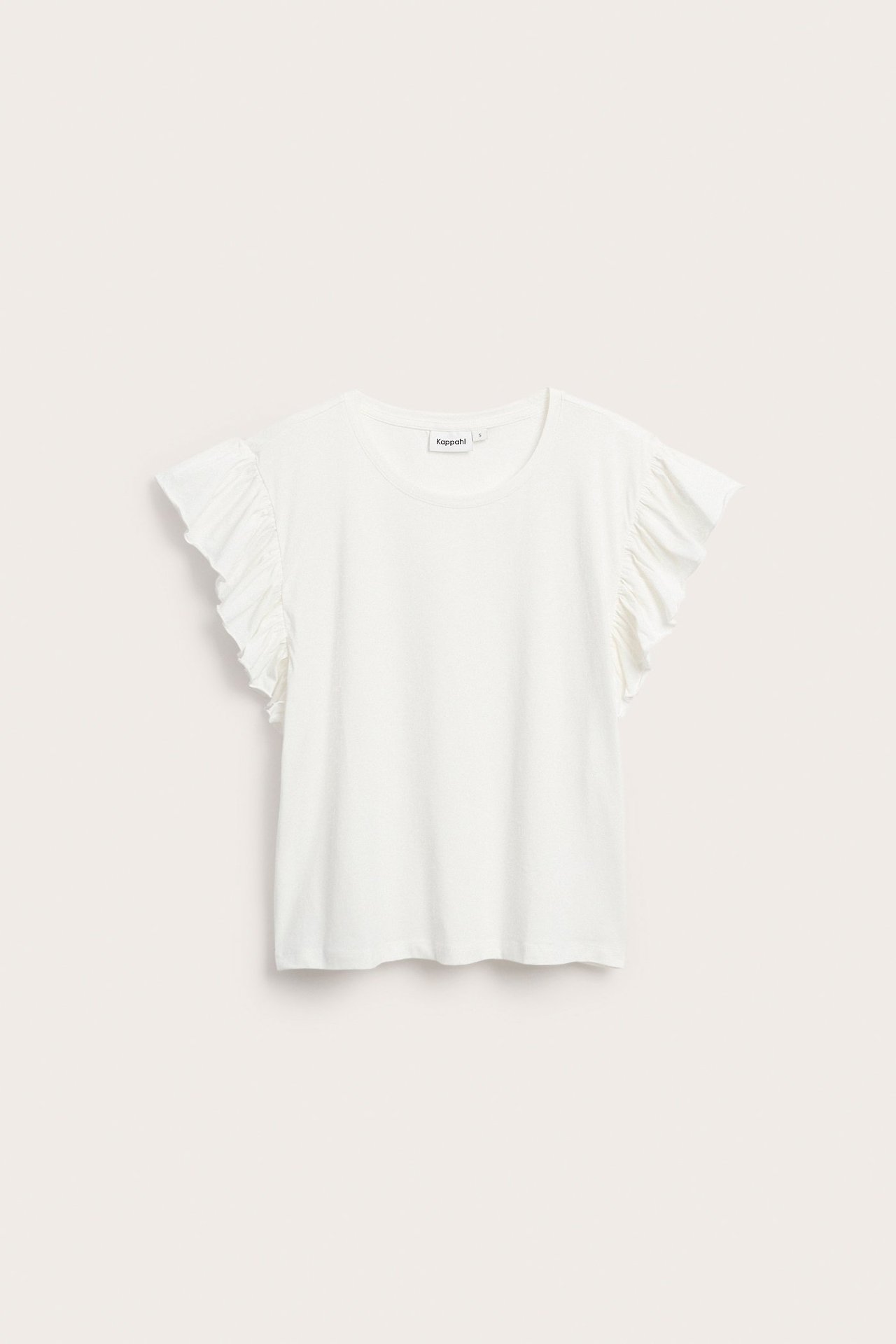 Edestä kuvattu luonnonvalkoinen puuvillajerseytoppi, jossa lyhyet frillaolkaimet.