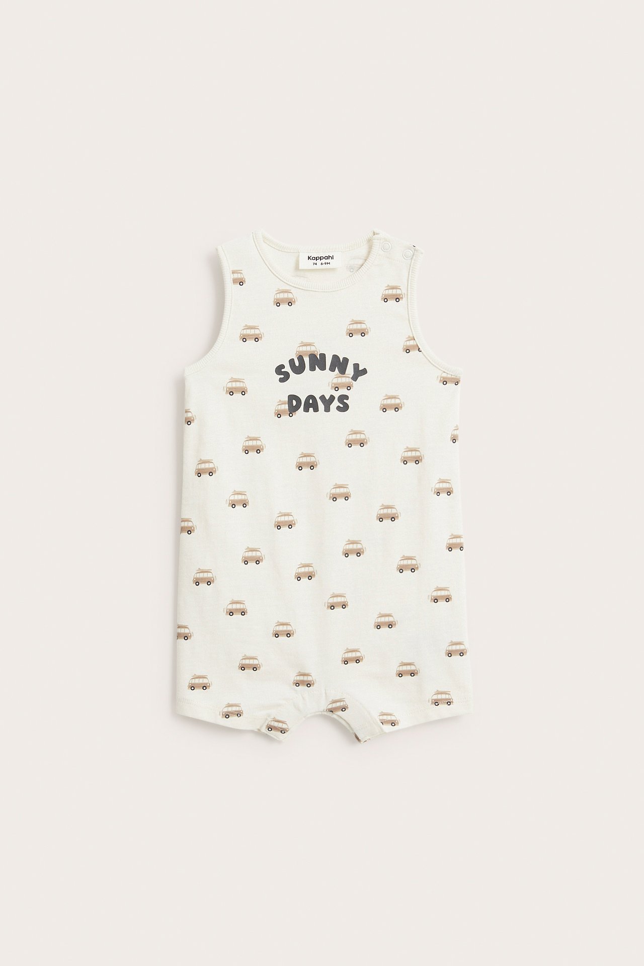 Edestä vauvan hihaton luonnonvalkoinen puuvillajerseyhaalari matkailuautokuvioinnilla ja "SUNNY DAYS" tekstillä.