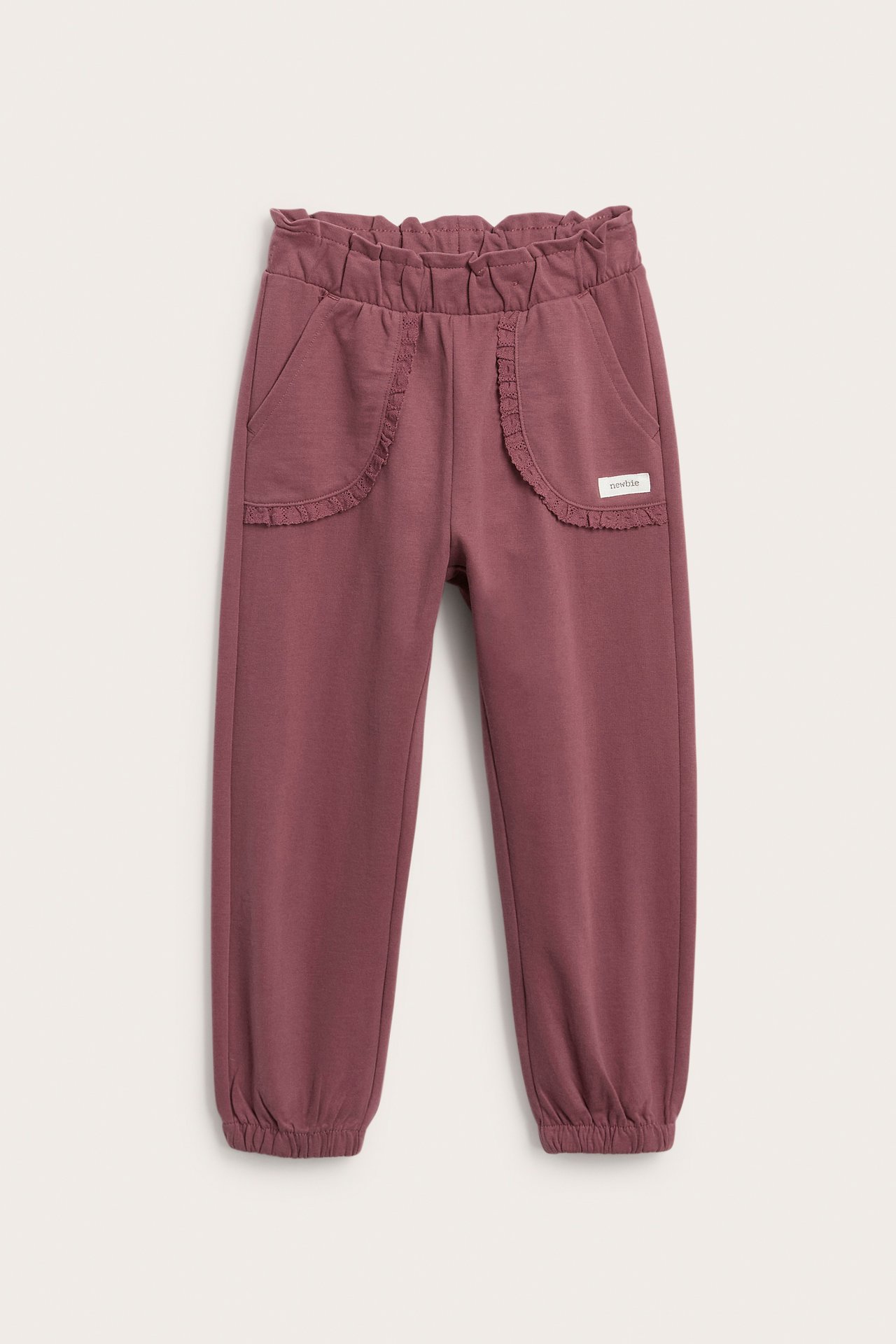 Joggingbyxor med spetsdetaljer