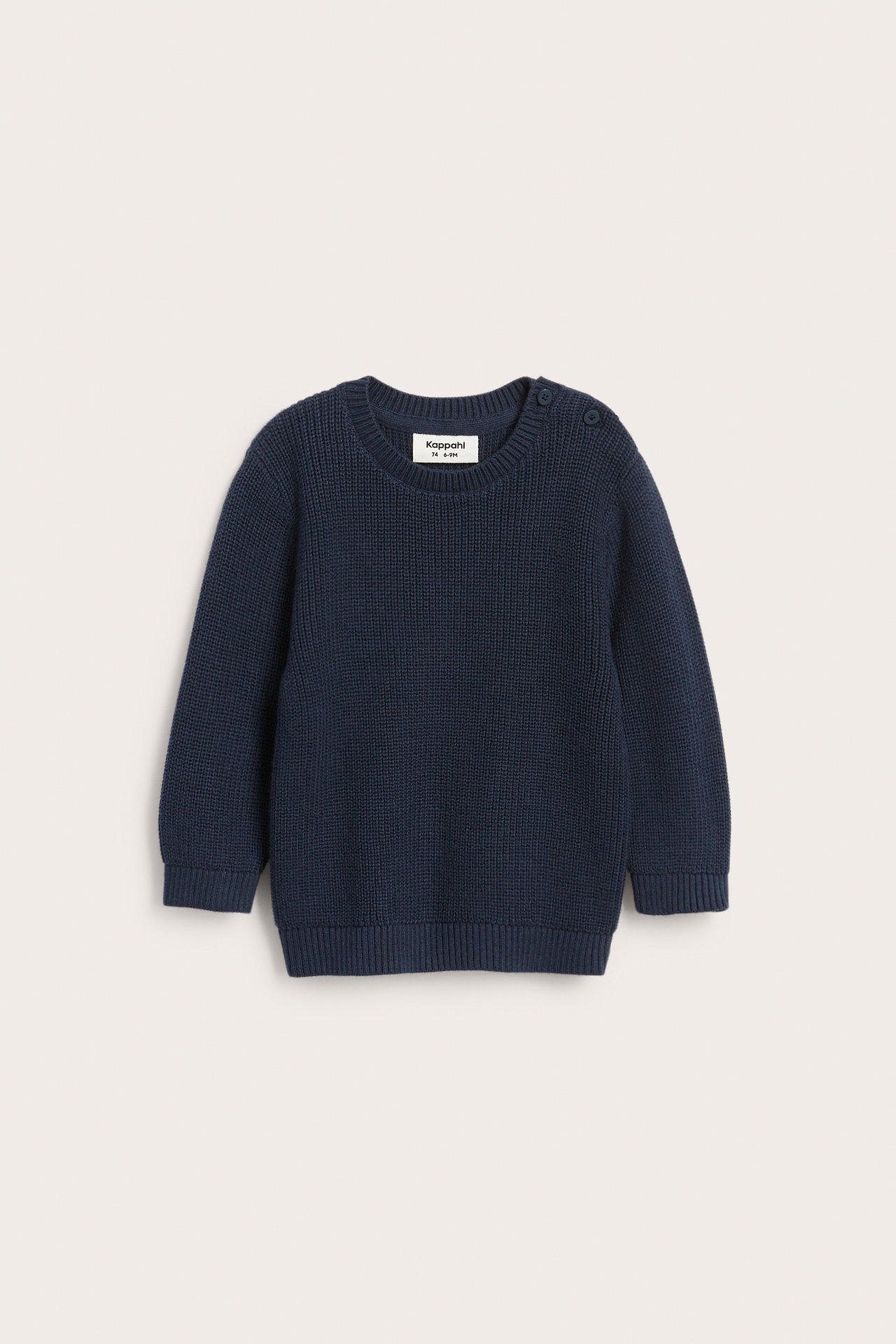 Dzianinowy sweter z guzikami na ramionach