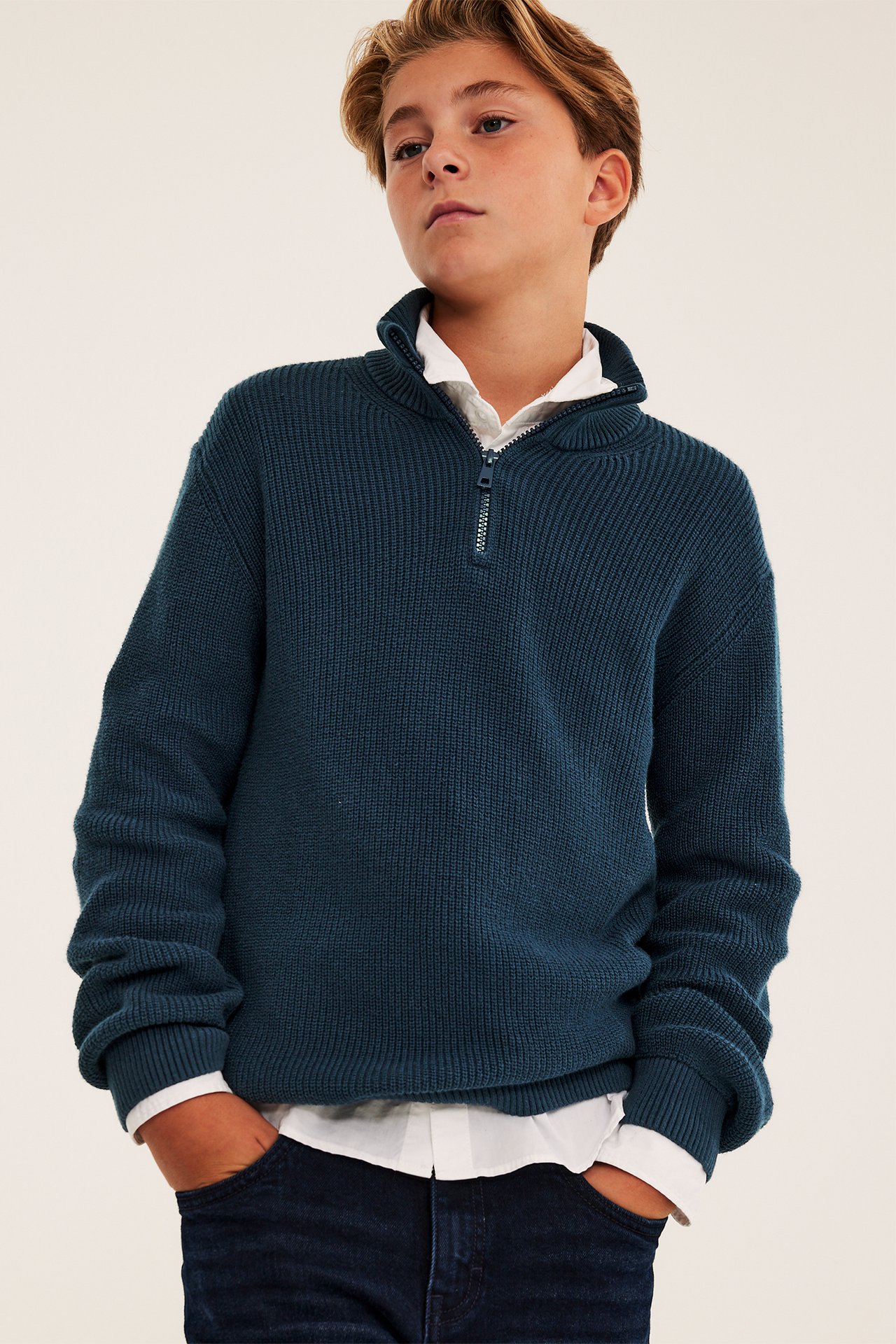 Stickad tröja med half-zip
