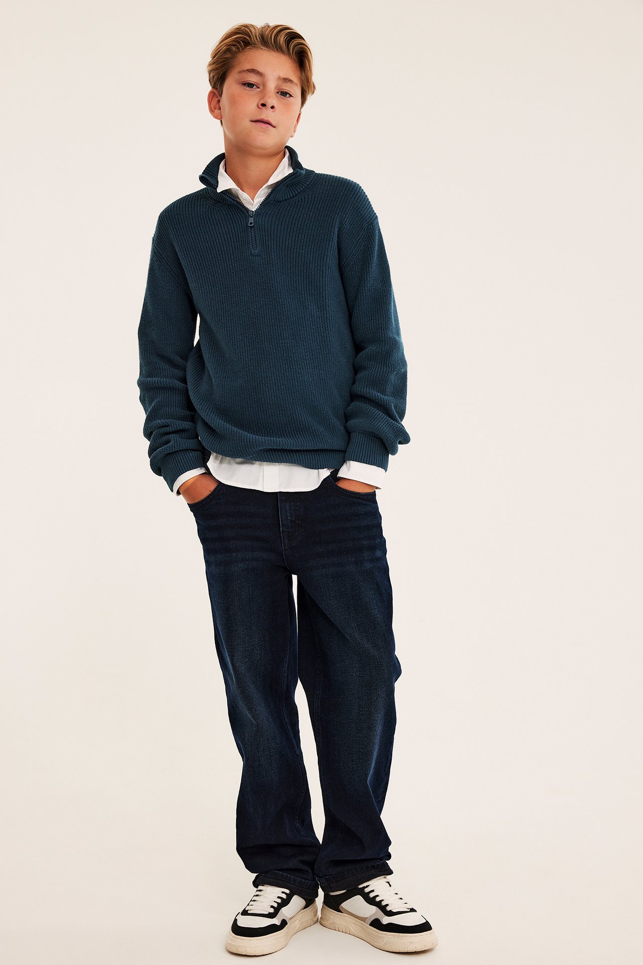 Stickad tröja med half-zip
