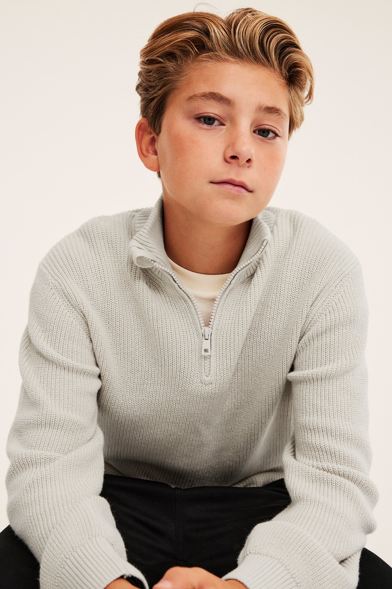 Stickad tröja med half-zip