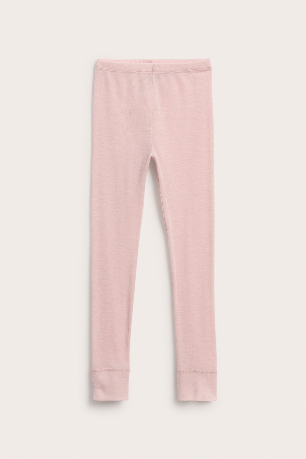 Forfra, lyse rosa lange barneleggings med elastisk midje og ribbestrikkede mansjetter.