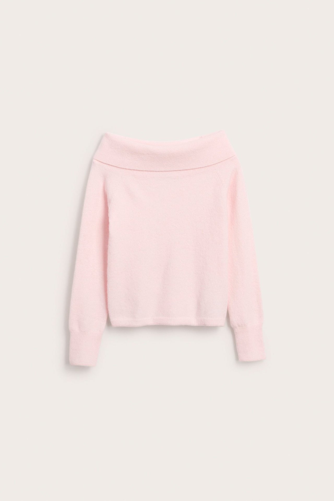 Frontbilde av en lyserosa strikket off-shoulder genser for barn med ribbekanter.